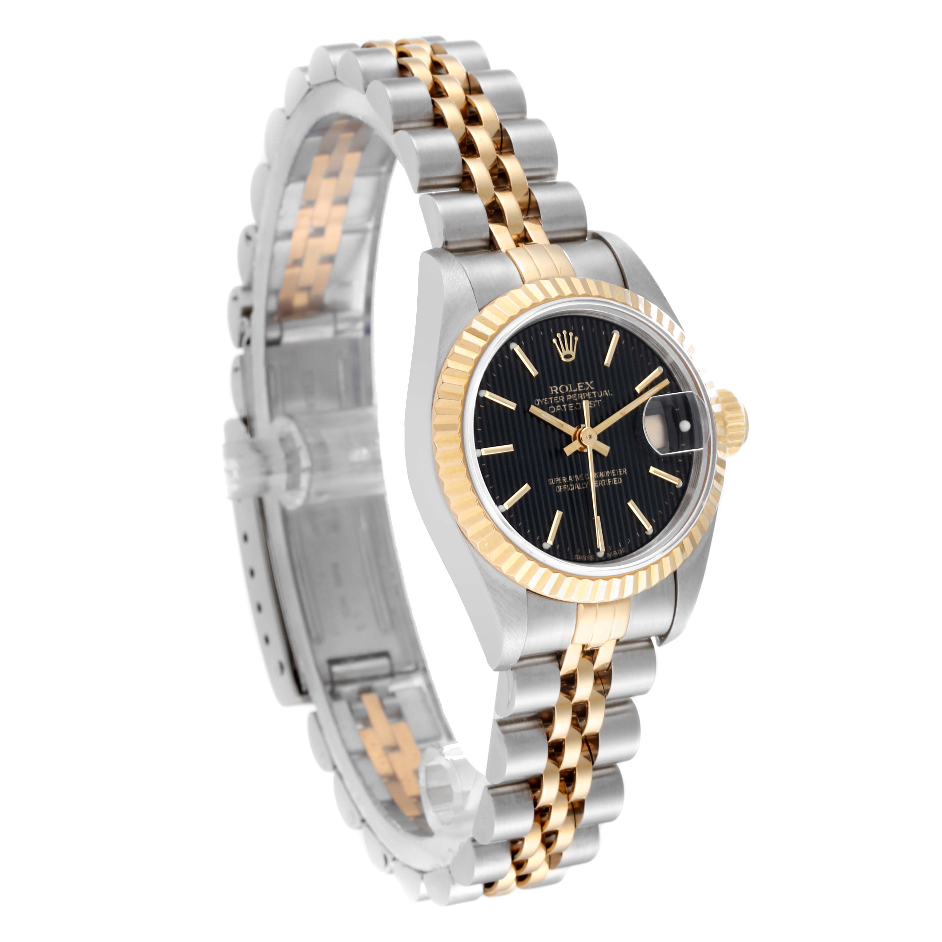 The image shows a Rolex Datejust 69173 Women's Steel and Gold (two tone) Black Dial 69173 Women's Steel and Gold (two tone) Black Dial watch, angled to display its face, bezel, and two-tone bracelet.