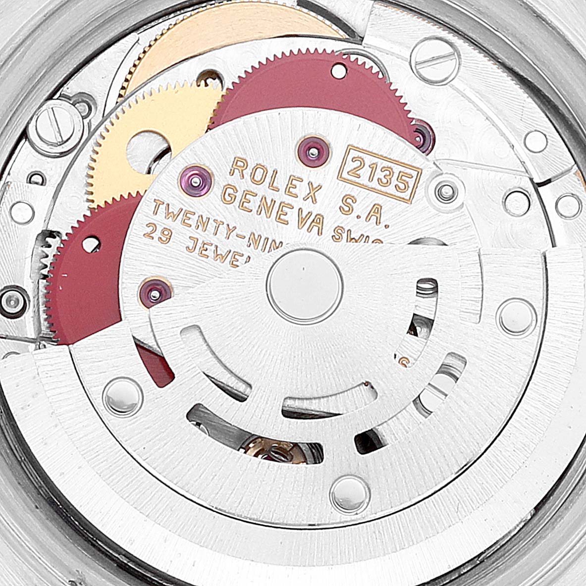 The image shows a close-up of the movement mechanism of a Rolex Datejust 69173 Women's Steel and Gold (two tone) Champagne Dial 69173 Women's Steel and Gold (two tone) Champagne Dial watch, showcasing gears and internal components.