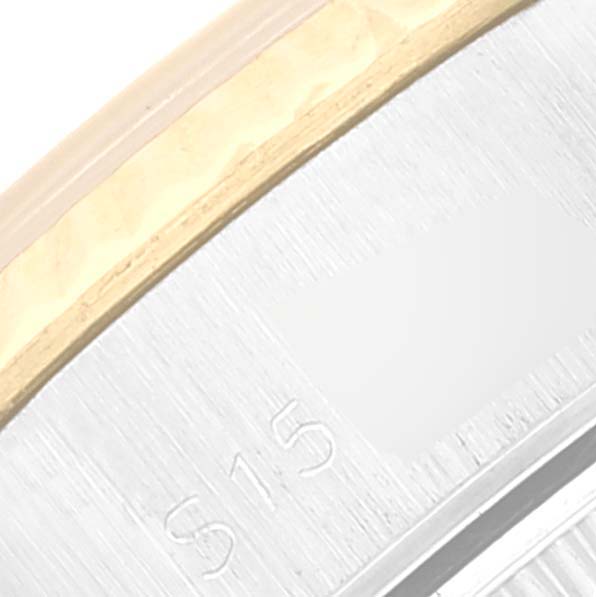 This close-up image of the Rolex Datejust 69173 Women's Steel and Gold (two tone) Champagne Dial 69173 Women's Steel and Gold (two tone) Champagne Dial watch shows the brand's signature edge, revealing part of the bezel and case.