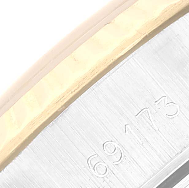 The image shows a close-up of the side of a Rolex Datejust 69173 Women's Steel and Gold (two tone) Champagne Dial 69173 Women's Steel and Gold (two tone) Champagne Dial watch, displaying part of the bezel and engraved numbers.