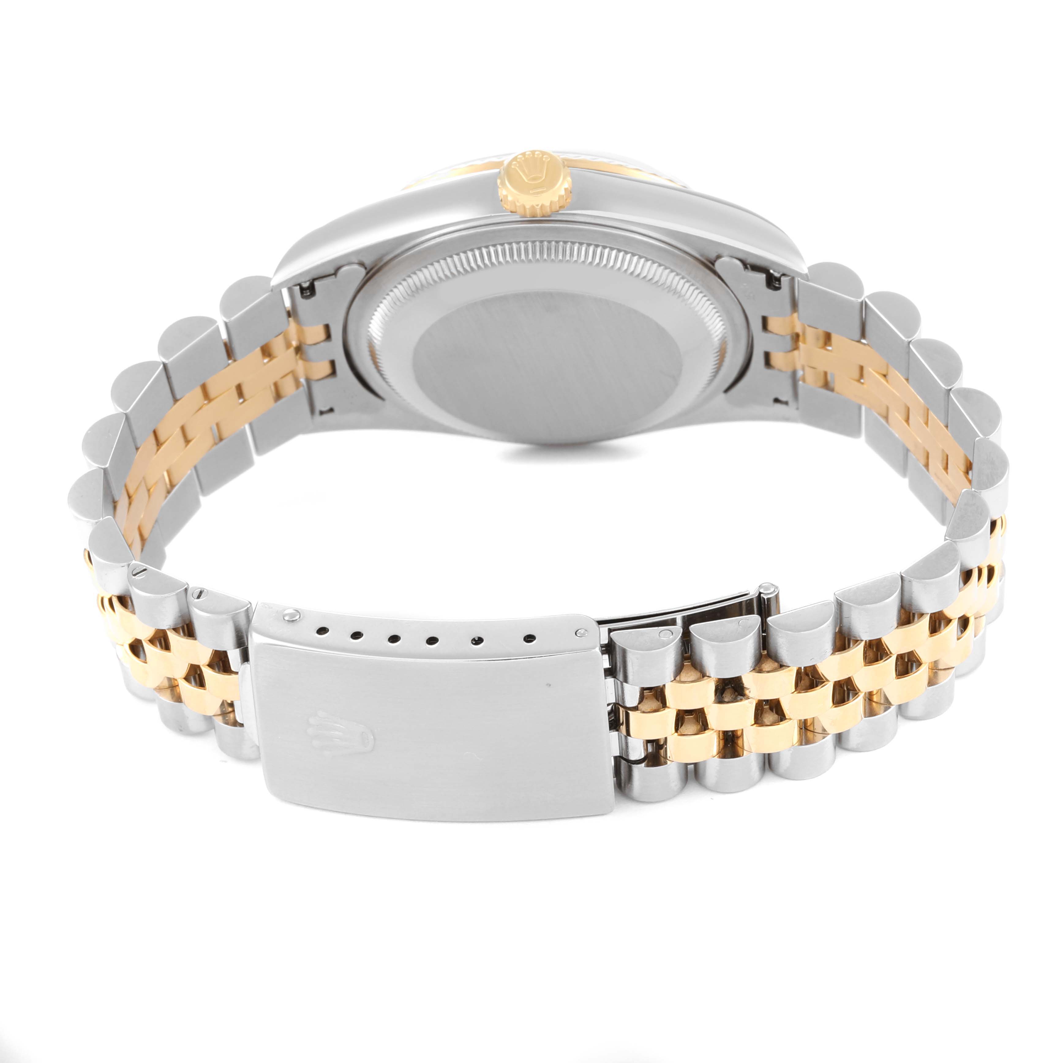 The Rolex Datejust 16233 Men's Steel and Gold (two tone) Champagne Dial 16233 Men's Steel and Gold (two tone) Champagne Dial watch is shown from the back angle, highlighting the caseback, crown, and two-tone strap with the clasp closed.