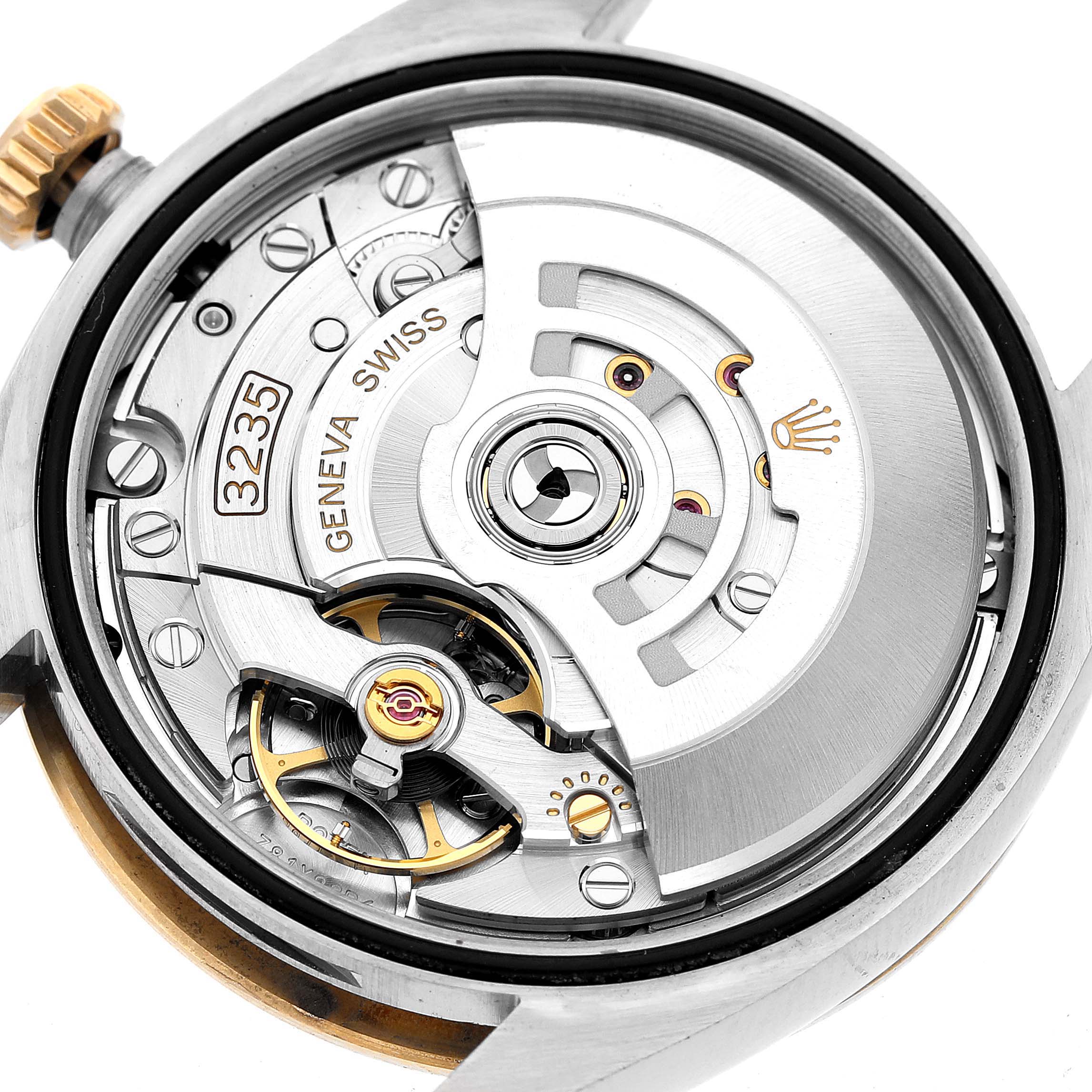 The image shows the movement of the Rolex Datejust 126233 Men's Steel and Gold (two tone) Champagne Dial watch from a top-down angle, highlighting components like the rotor and jewel bearings.