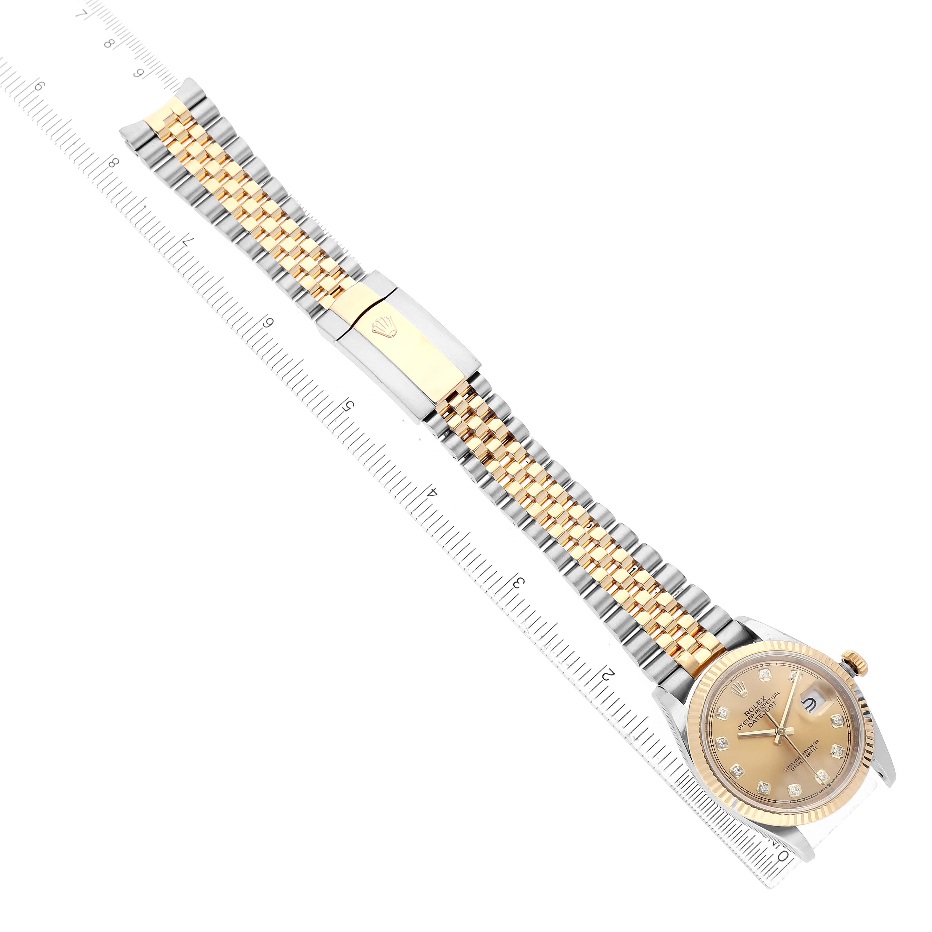 The Rolex Datejust 126233 Men's Steel and Gold (two tone) Champagne Dial watch is shown from a top view, displaying the face, bezel, bracelet, and clasp.