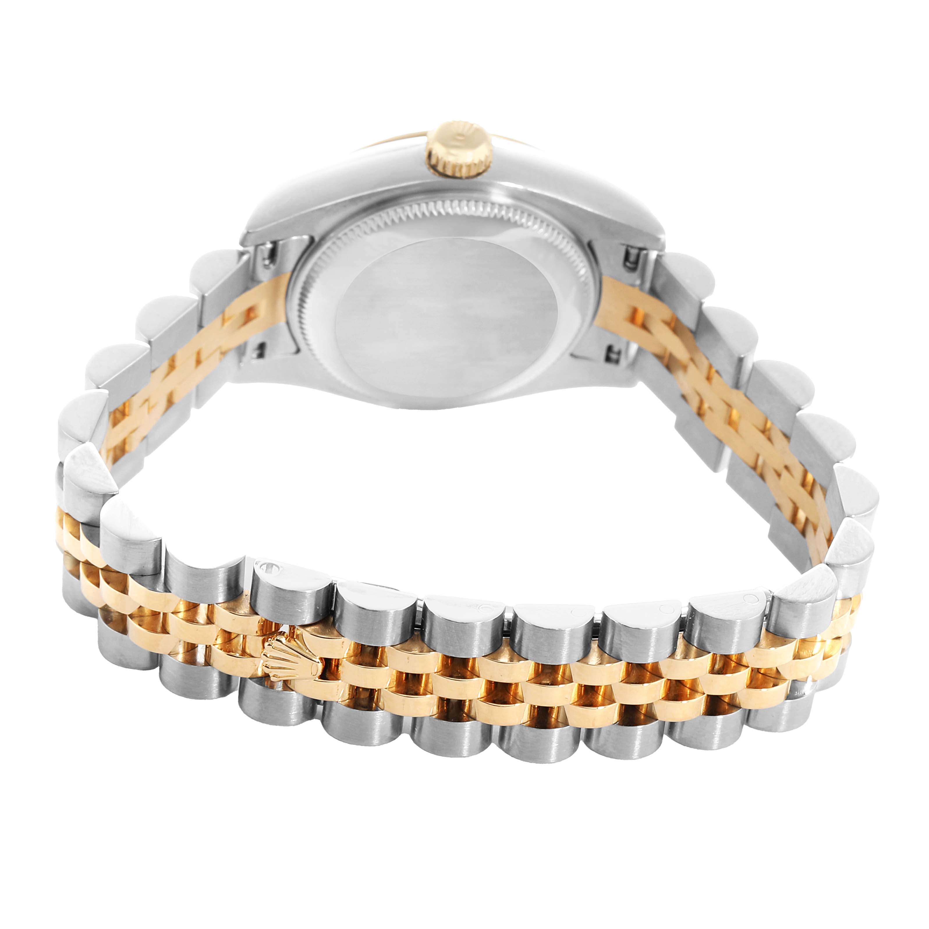 The image shows a Rolex Datejust 179173 Women's Steel and Gold (two tone) Champagne Dial watch from a rear angle, highlighting the two-tone bracelet and case back.