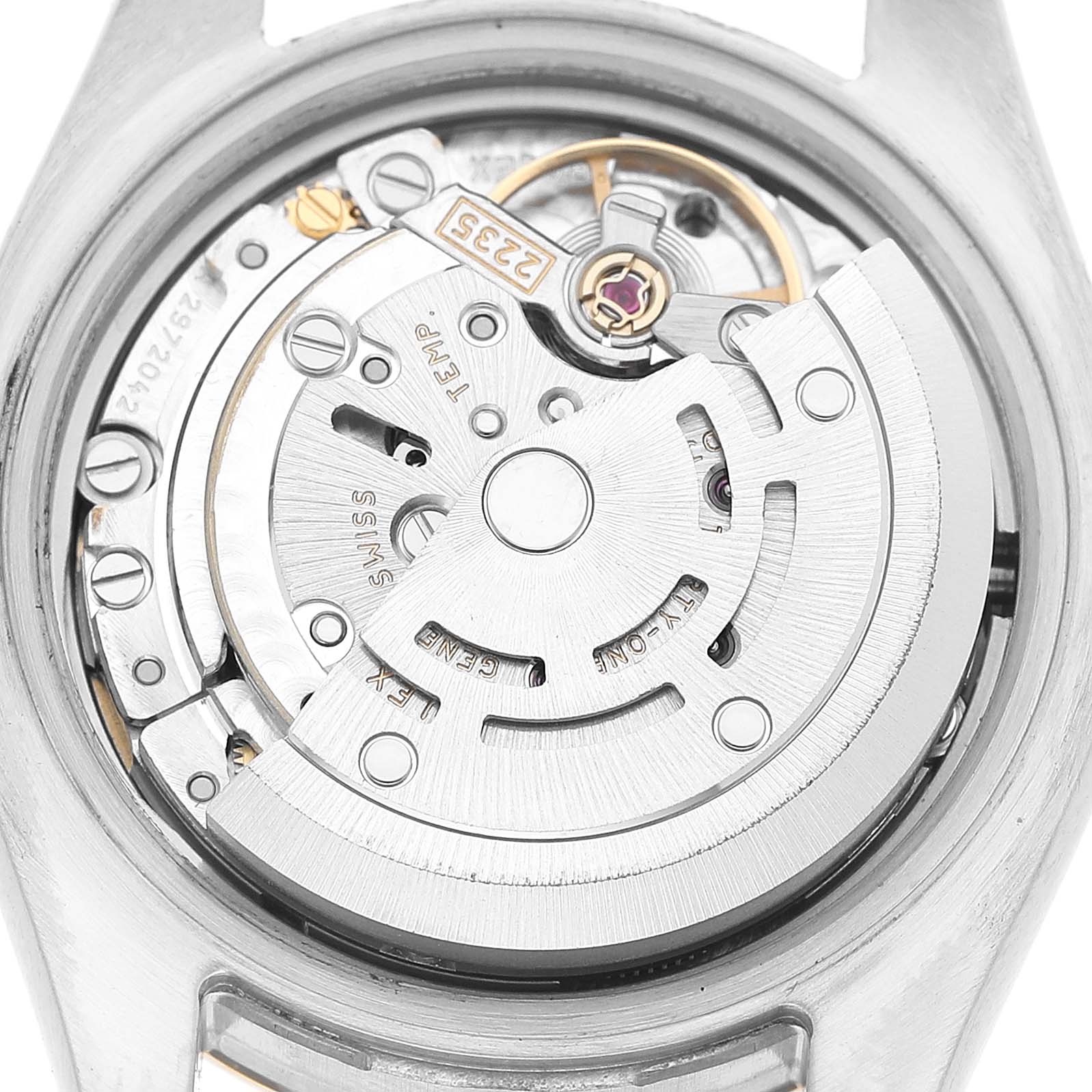 The image shows the movement of a Rolex Datejust 179173 Women's Steel and Gold (two tone) Champagne Dial watch from the back, highlighting the rotor and gears.