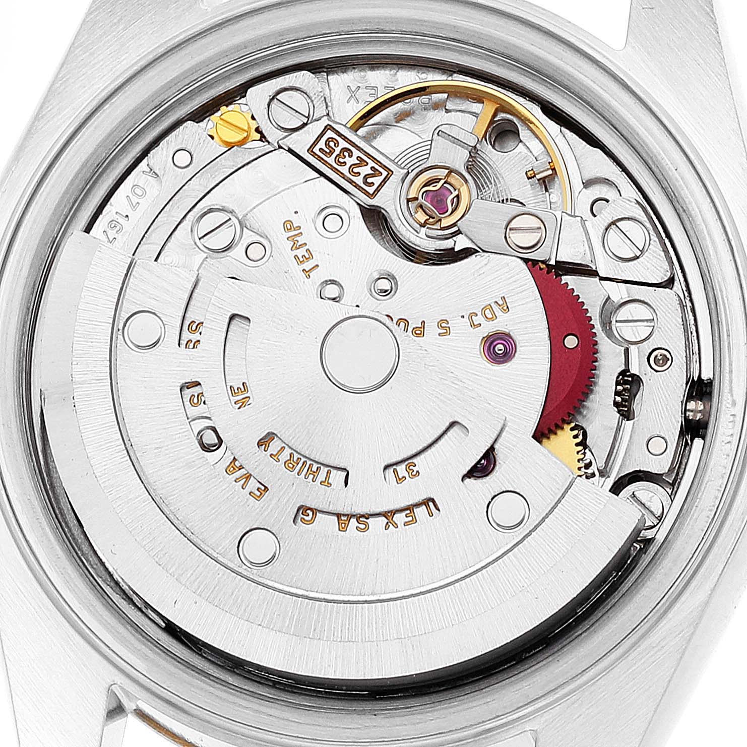 This image shows a close-up view of the internal mechanical movement of a Rolex Datejust 79173 Women's Steel and Gold (two tone) Champagne Dial 79173 Women's Steel and Gold (two tone) Champagne Dial watch.
