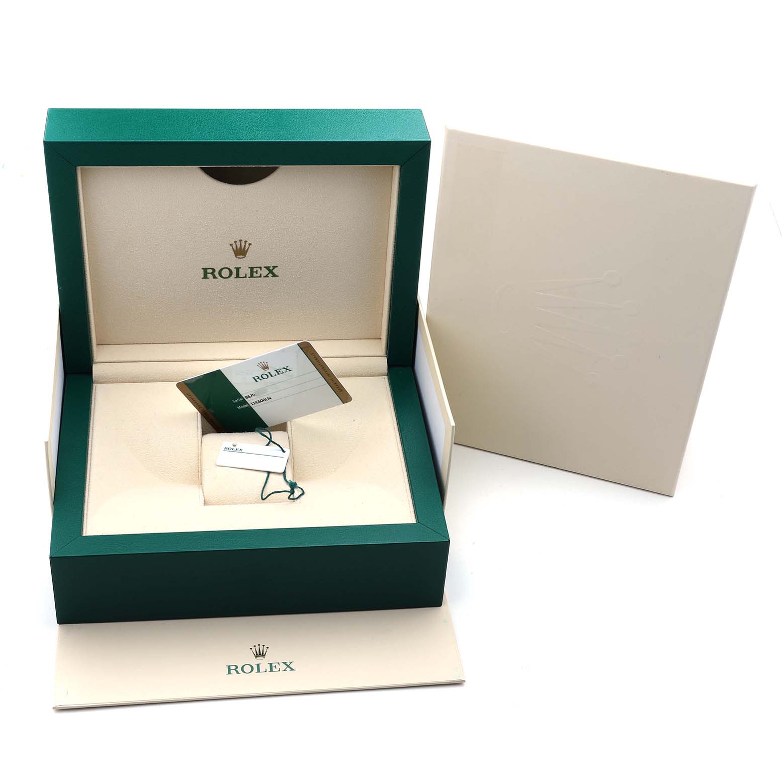 The image shows a Rolex Daytona 116500LN Men's Stainless Steel Black Dial watch box, with a beige interior, tags, and documents.