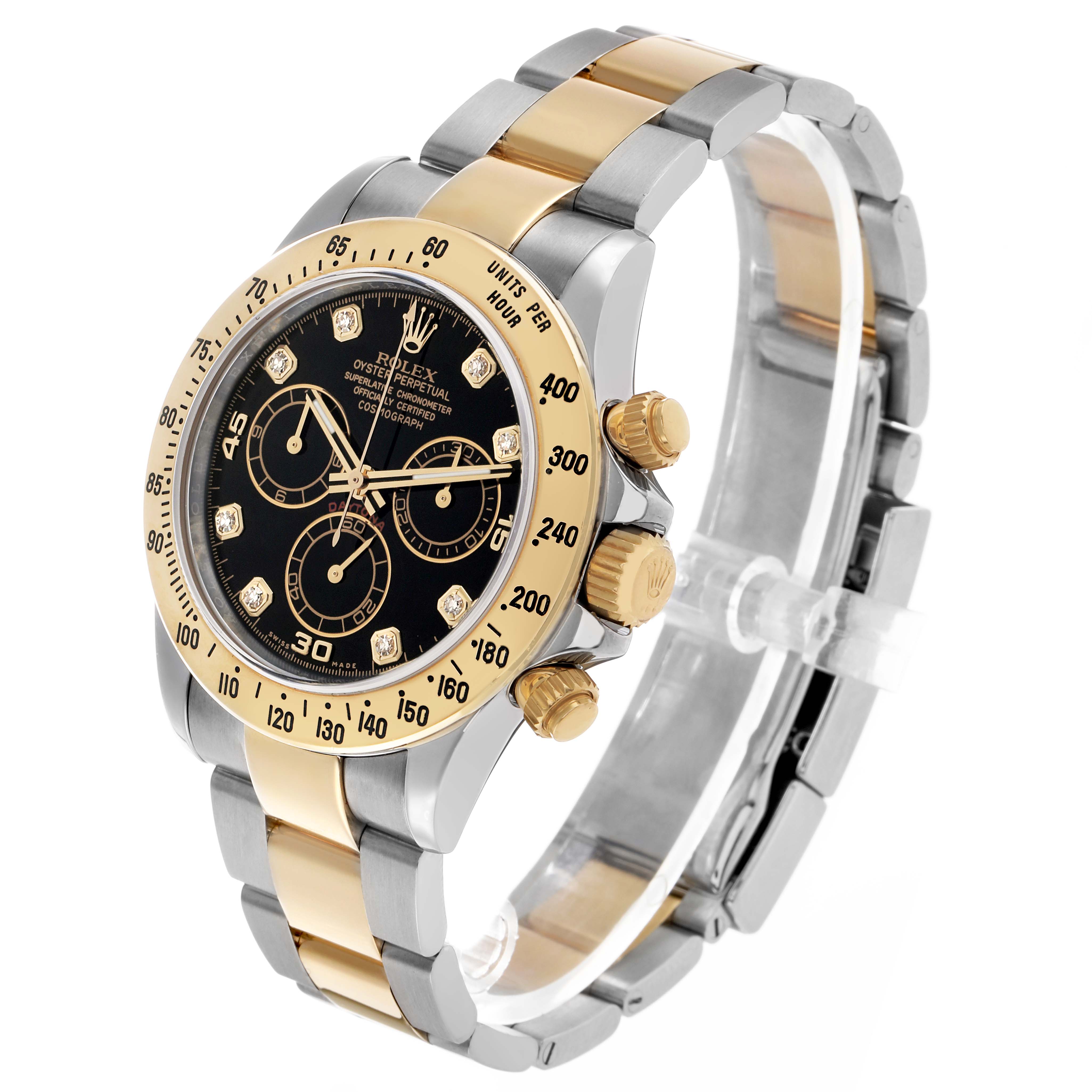 The Rolex Daytona 116523 Men's Steel and Gold (two tone) Black Dial watch is shown at a three-quarter angle, highlighting its gold bezel, black dial, chronograph subdials, and two-tone bracelet.