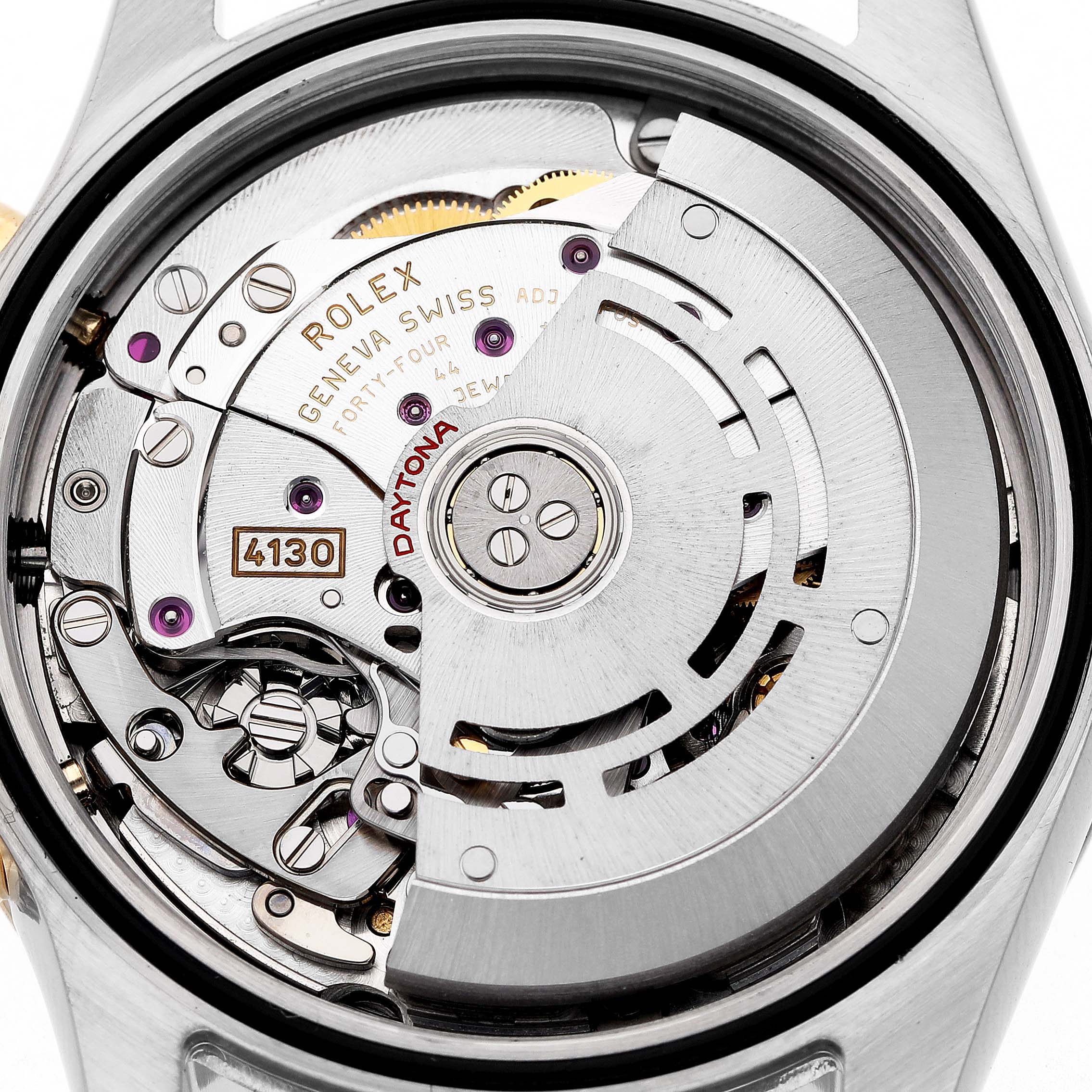 The image shows the movement of a Rolex Daytona 116523 Men's Steel and Gold (two tone) Black Dial watch from a top-down angle, highlighting its intricate mechanical parts.