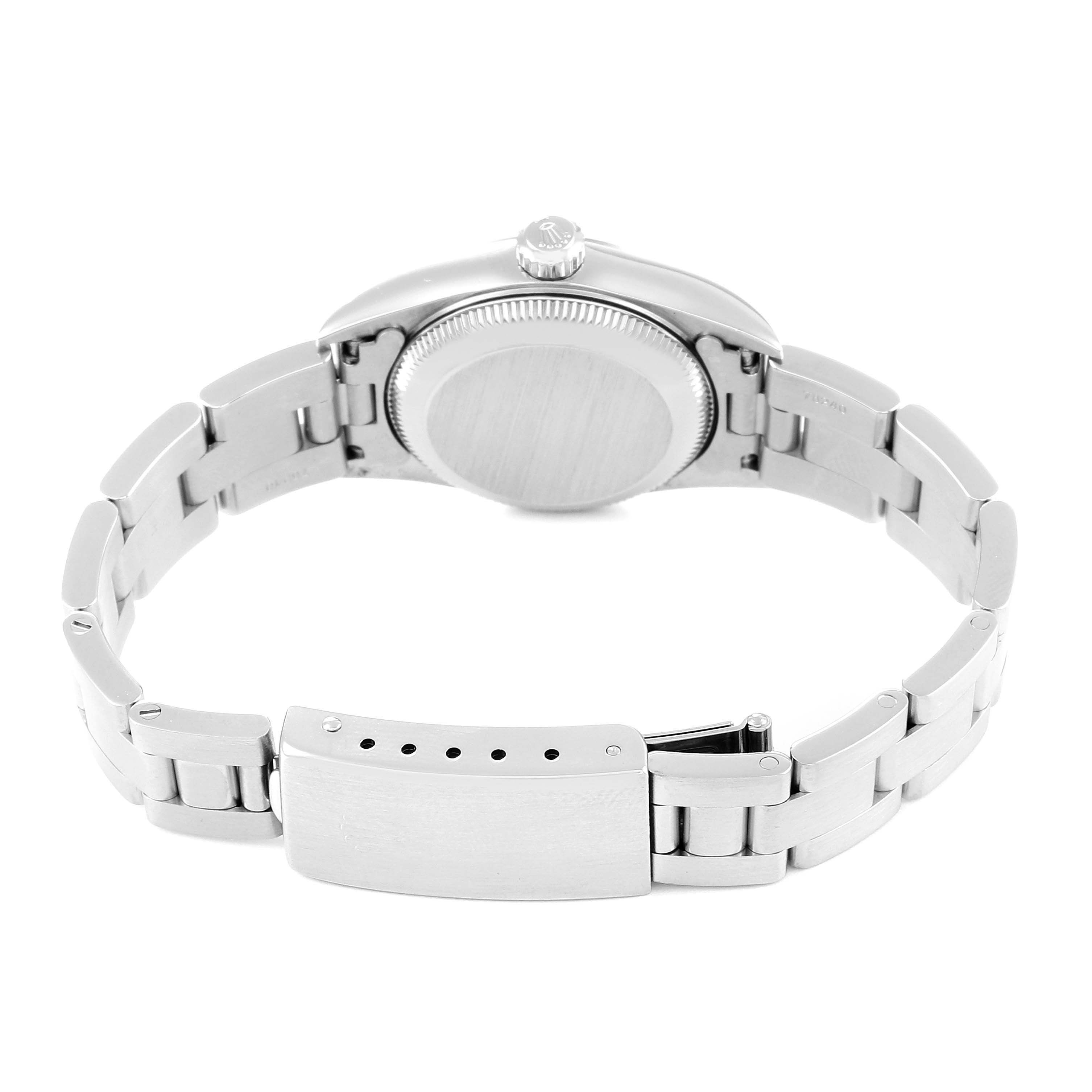 The image shows the back view of the Rolex Oyster Perpetual 76080 Women's Stainless Steel Blue Dial 76080 Women's Stainless Steel Blue Dial watch, displaying its case back, crown, and metal bracelet with clasp.