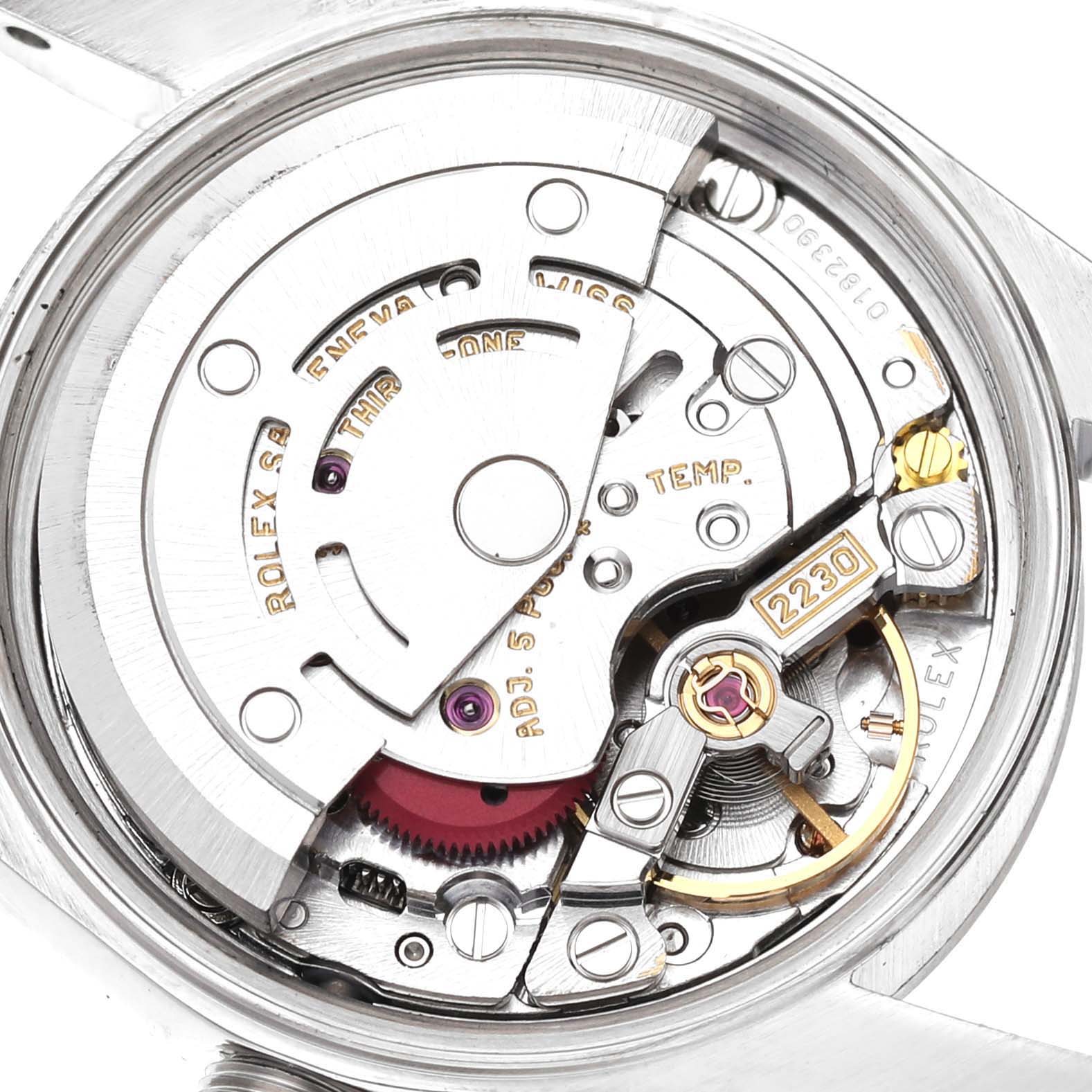 This image shows the internal movement and mechanism of the Rolex Oyster Perpetual 76080 Women's Stainless Steel Blue Dial 76080 Women's Stainless Steel Blue Dial watch at a close-up angle.