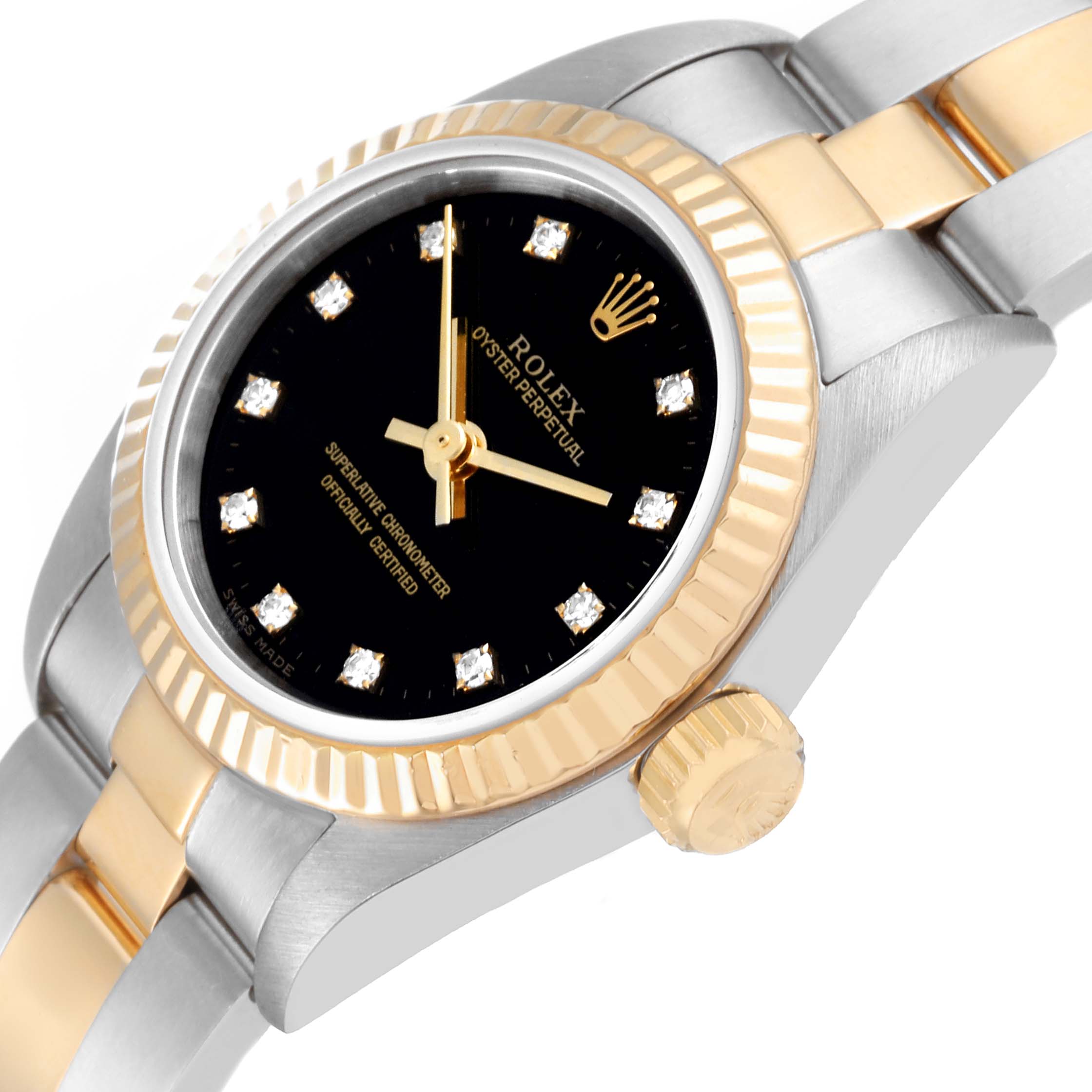 This image showcases a Rolex Oyster Perpetual 67193 Women's Steel and Gold (two tone) Black Dial 67193 Women's Steel and Gold (two tone) Black Dial watch at a slight angle, highlighting the bezel, crown, and part of the bracelet.