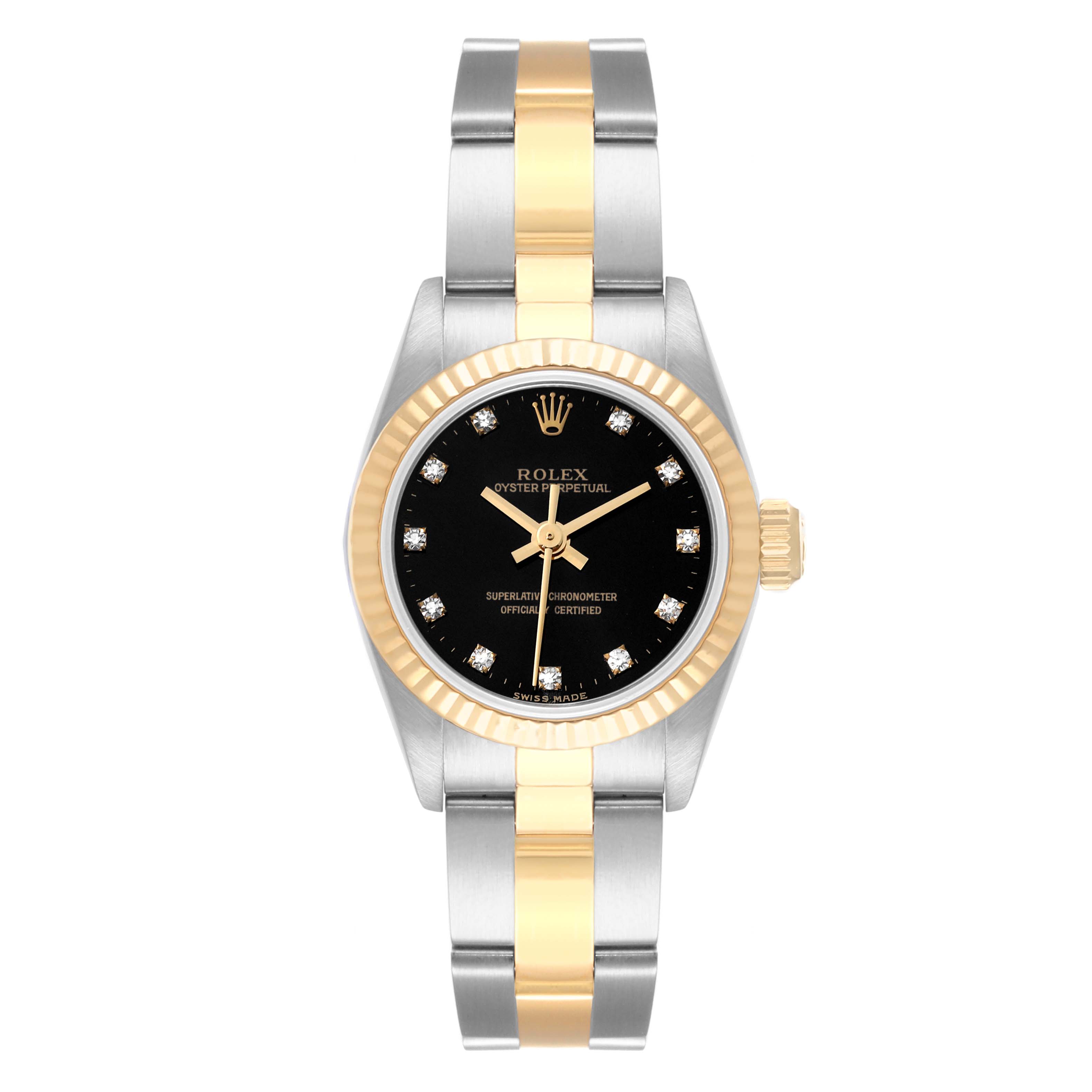 The Rolex Oyster Perpetual 67193 Women's Steel and Gold (two tone) Black Dial 67193 Women's Steel and Gold (two tone) Black Dial watch is shown from a frontal angle, displaying its dial, hands, bezel, and two-tone bracelet.
