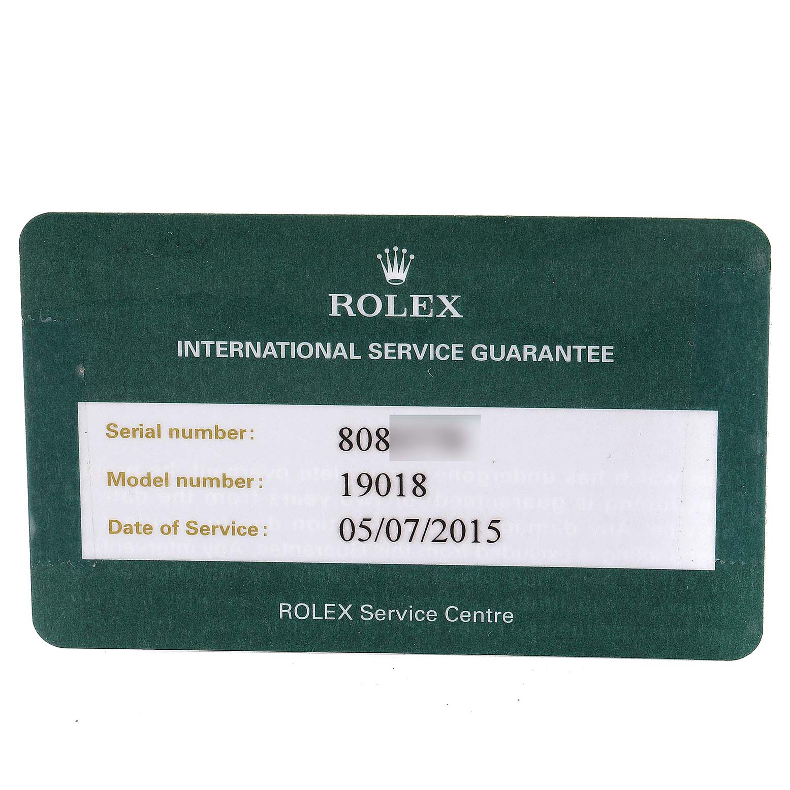 The image shows a Rolex International Service Guarantee card for the President model, displaying serial, model numbers, and service date.