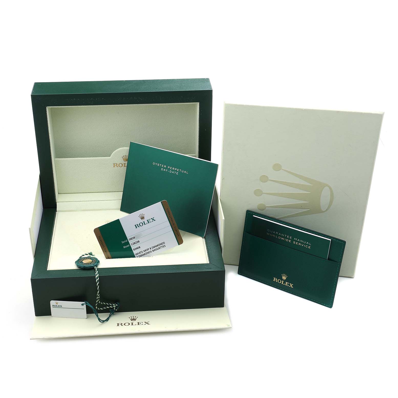 The image shows the Rolex President 128238 Men's Yellow Gold Mother of Pearl Dial watch box, guarantee card, manual, and tag laid out at an angle.