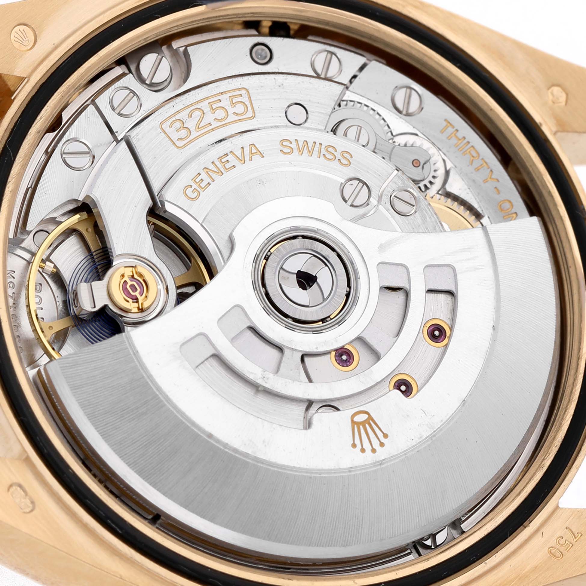 The image shows the movement and inner mechanism of a Rolex President 128238 Men's Yellow Gold Mother of Pearl Dial watch, viewed from the back.