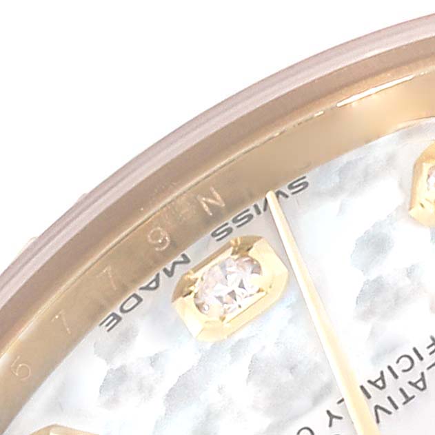 This close-up image shows a partial view of the dial of the Rolex President 178278 Women's Yellow Gold Mother of Pearl Dial 178278 Women's Yellow Gold Mother of Pearl Dial model, highlighting the Swiss Made inscription and diamond hour markers.