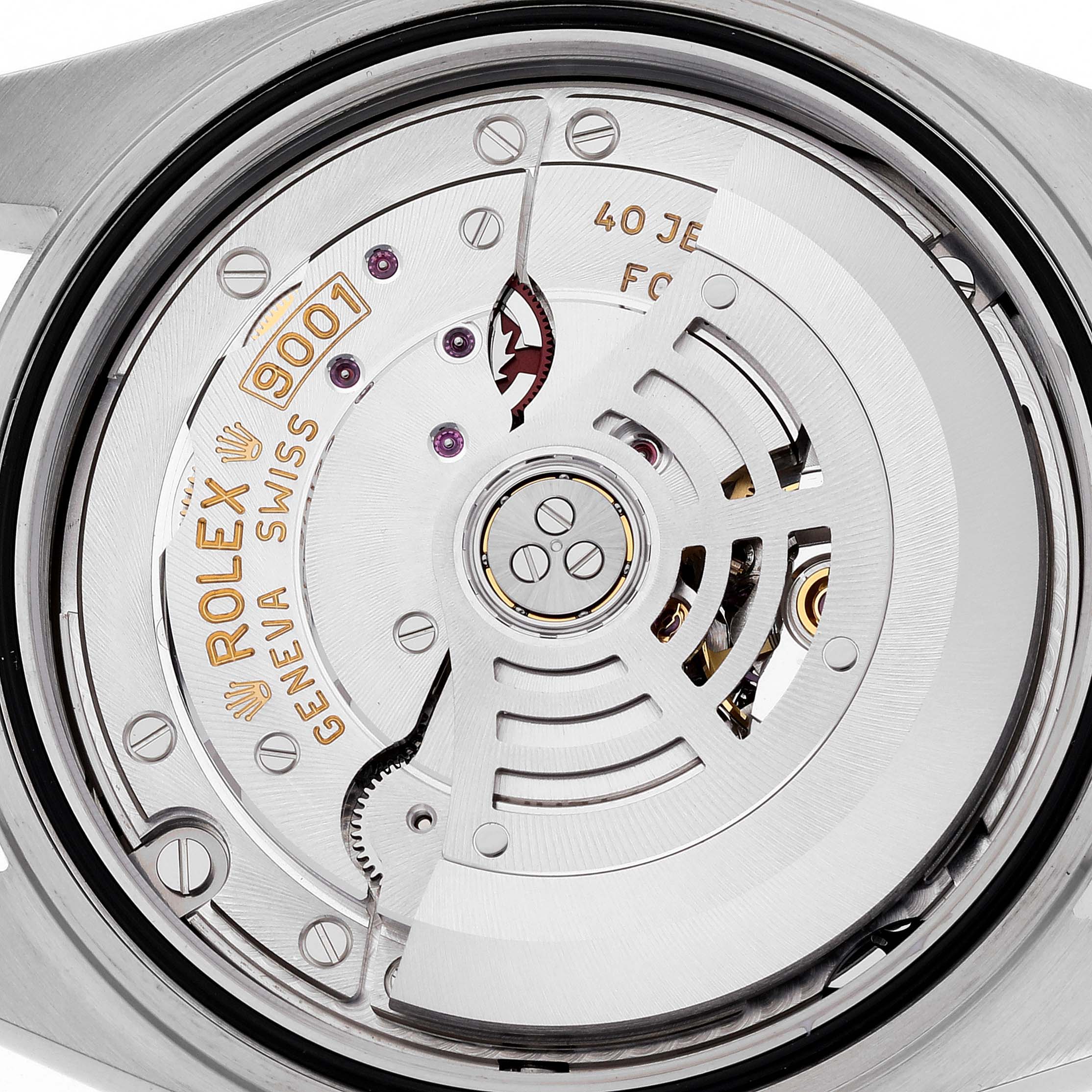 The image shows the movement and intricate internal parts of a Rolex Sky-Dweller 326933 Men's Steel and Gold (two tone) White Dial 326933 Men's Steel and Gold (two tone) White Dial watch from a rear angle.