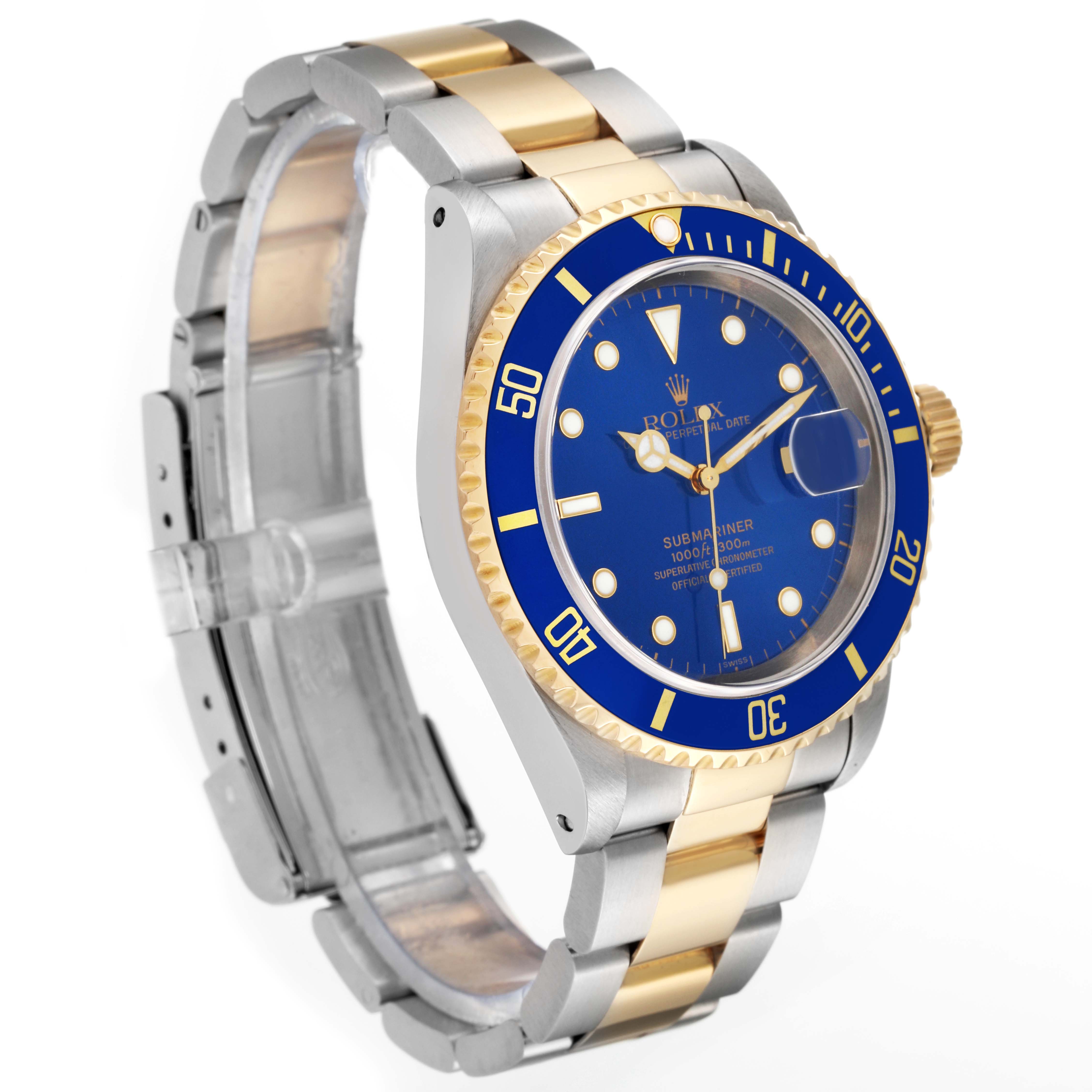 The image shows a three-quarter angle view of a Rolex Submariner 16613 Men's Steel and Gold (two tone) Blue Dial 16613 Men's Steel and Gold (two tone) Blue Dial watch, highlighting the blue dial, bezel, and two-tone bracelet.