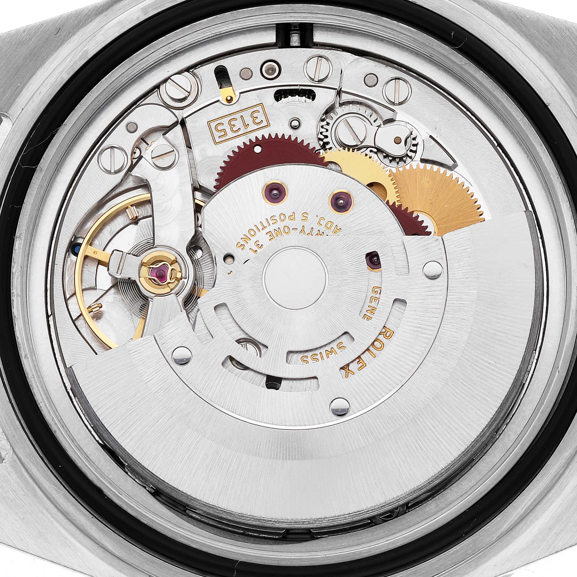 This image shows a detailed view of the movement and inner mechanism of a Rolex Submariner 16613 Men
s Steel and Gold (two tone) Blue Dial 16613 Men
s Steel and Gold (two tone) Blue Dial watch.