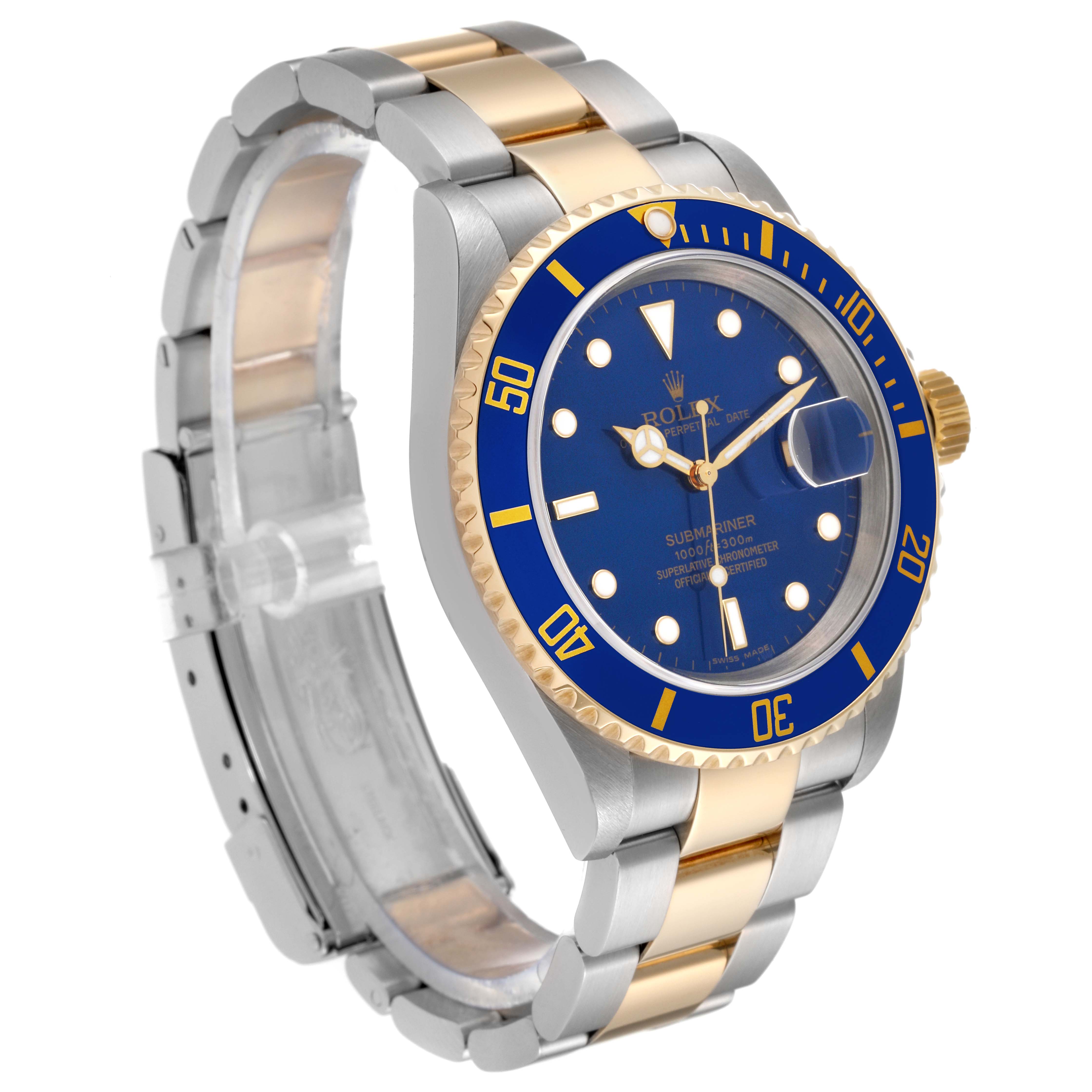 The image shows a Rolex Submariner 16613 Men
s Steel and Gold (two tone) Blue Dial 16613 Men
s Steel and Gold (two tone) Blue Dial watch at a three-quarters angle, highlighting its blue dial, bezel, and two-tone band.