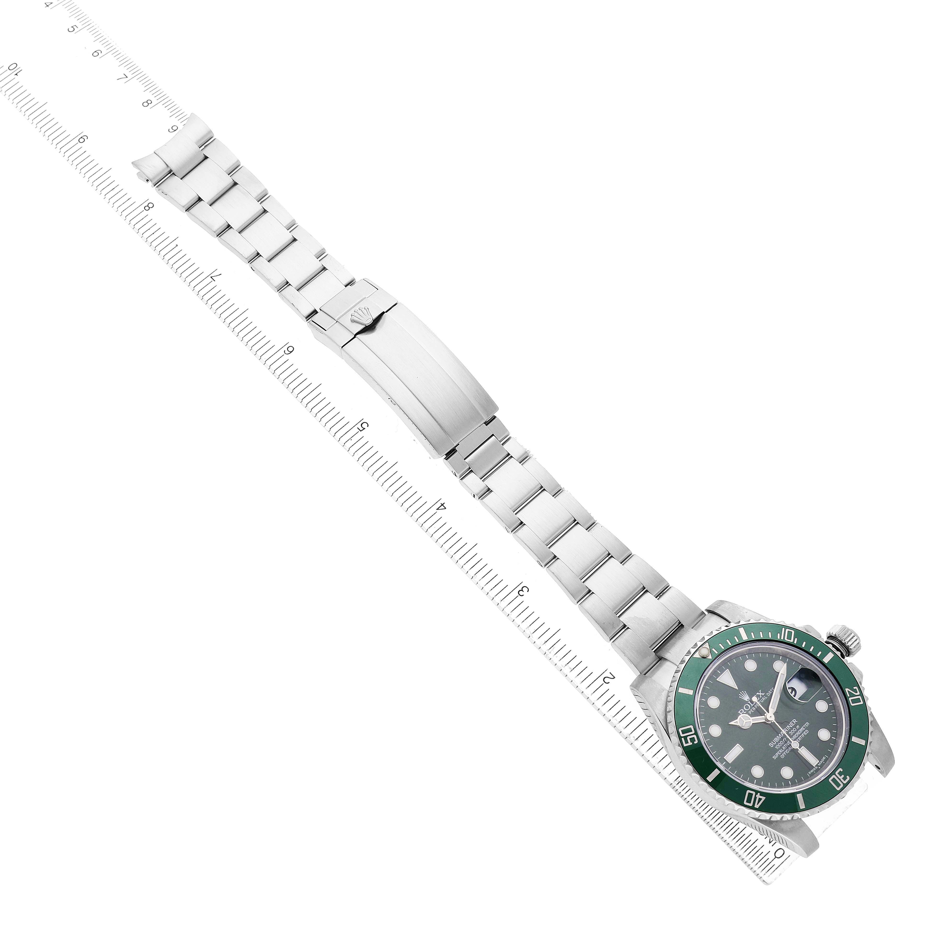 The Rolex Submariner 116610LV Men's Stainless Steel Green Dial watch is shown from an overhead angle, highlighting its face, band, and clasp.