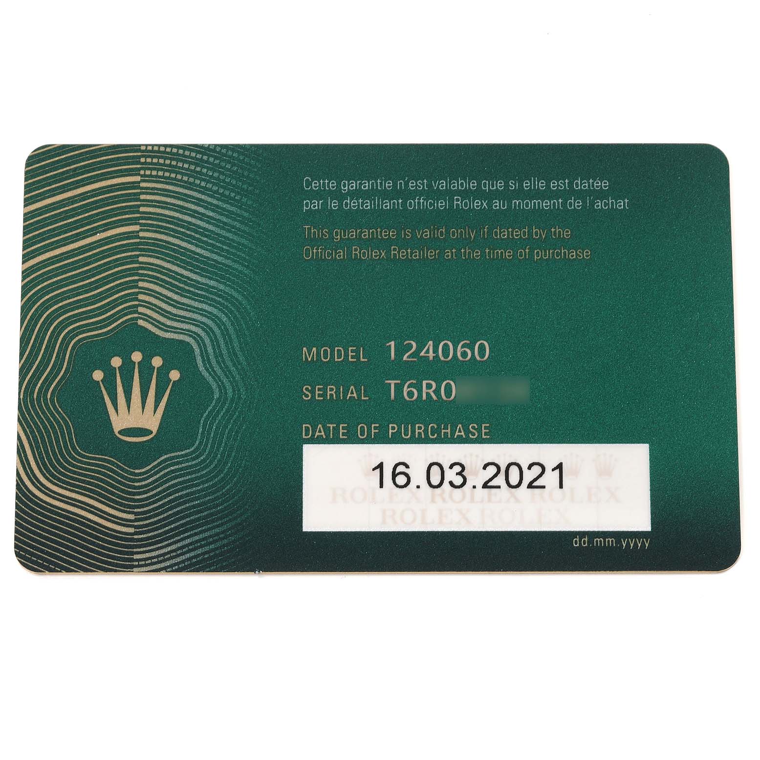 This image shows the warranty card for a Rolex Submariner 124060 Men
s Stainless Steel Black Dial 124060 Men
s Stainless Steel Black Dial model 124060, featuring the serial number and date of purchase.