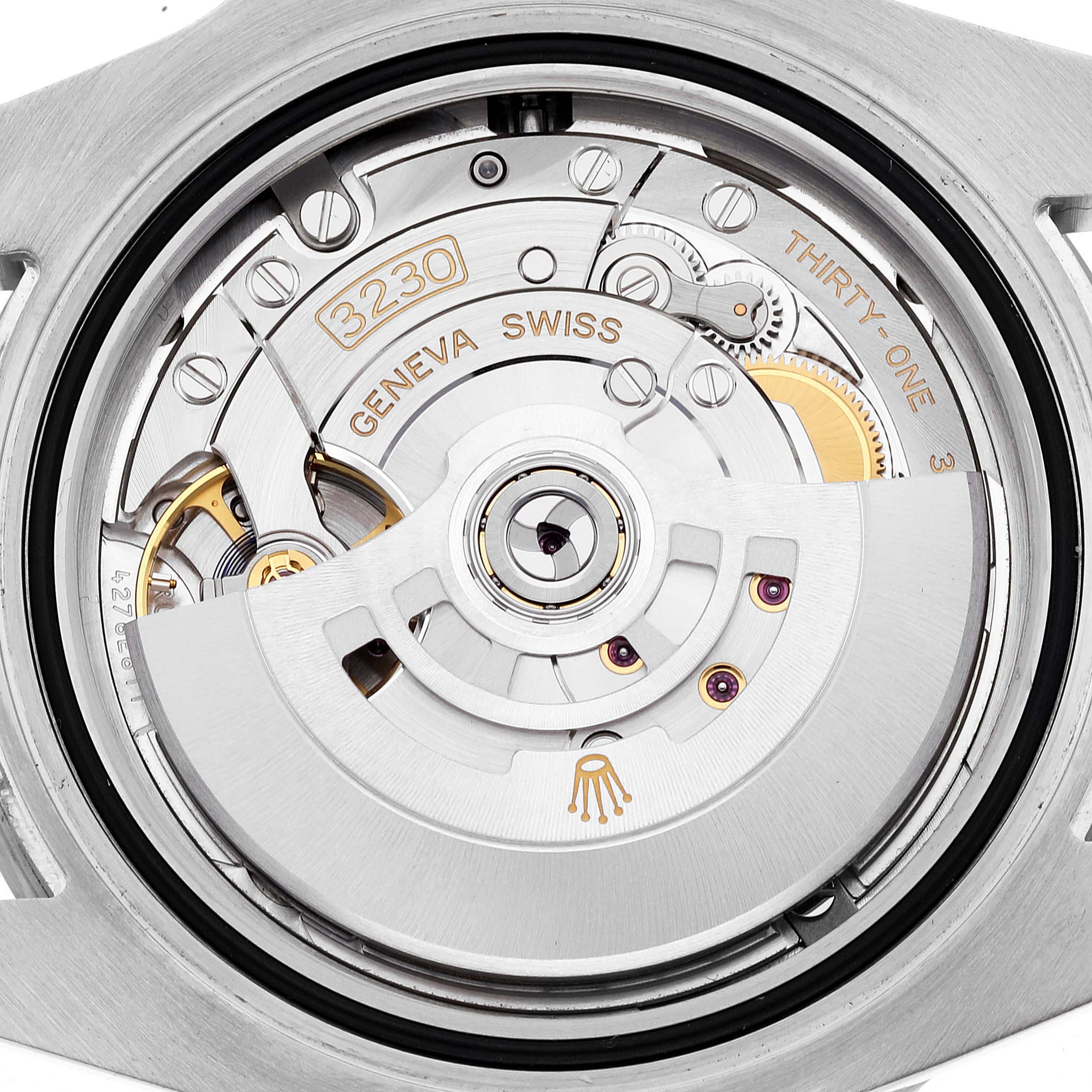 This is a close-up view of the internal mechanical movement of a Rolex Submariner 124060 Men
s Stainless Steel Black Dial 124060 Men
s Stainless Steel Black Dial watch, showcasing the intricate components.