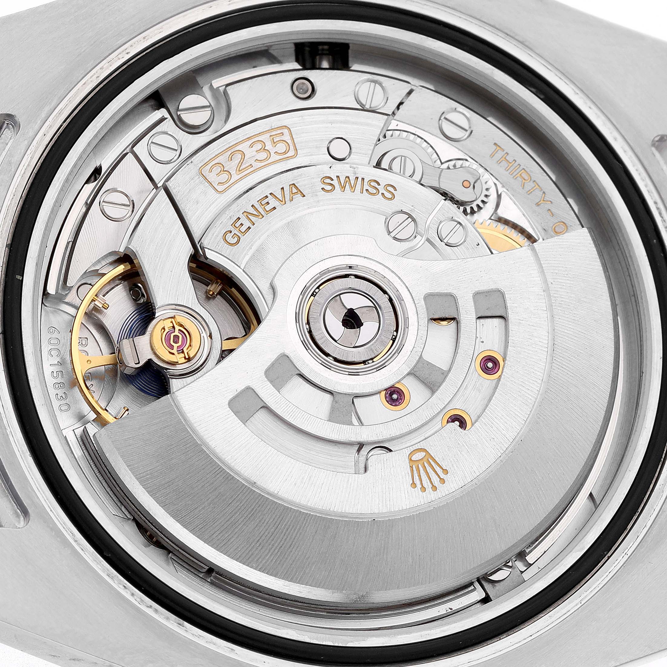 The image shows the movement and internal mechanism of a Rolex Submariner 126610LN Men's Stainless Steel Black Dial watch, focusing on the caliber 3235.