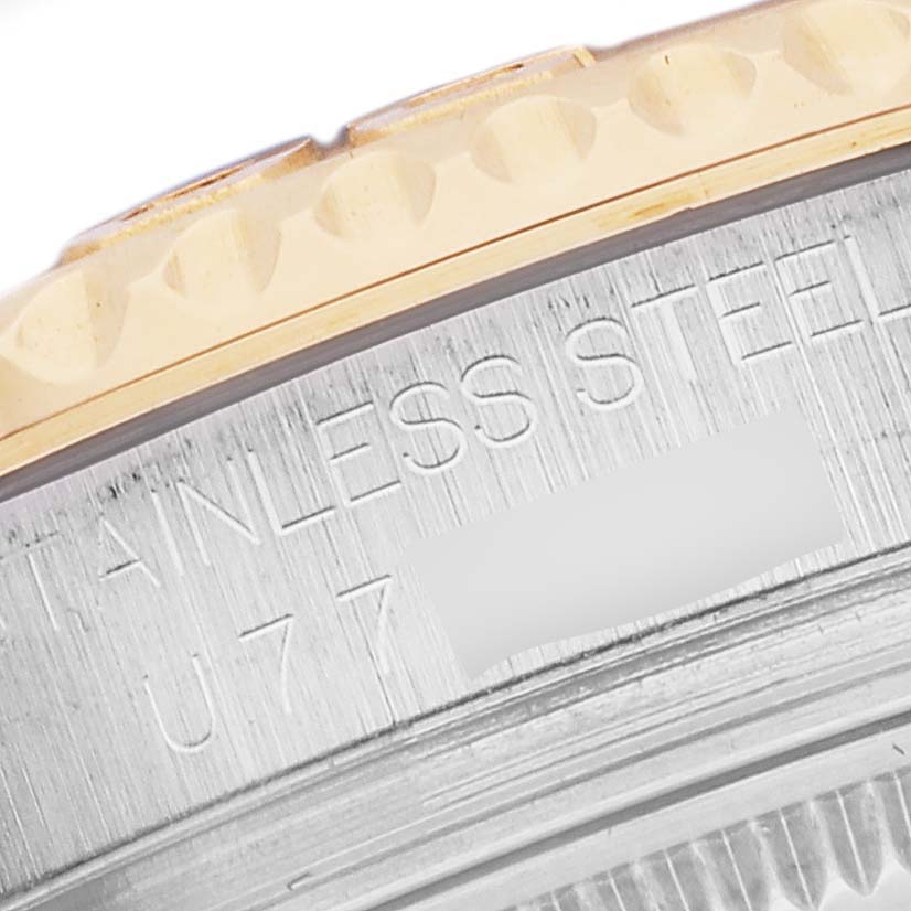 The image shows a close-up view of the stainless steel and gold bezel edge of a Rolex Yacht-Master 68623 Men's Steel and Gold (two tone) Blue Dial 68623 Men's Steel and Gold (two tone) Blue Dial watch.