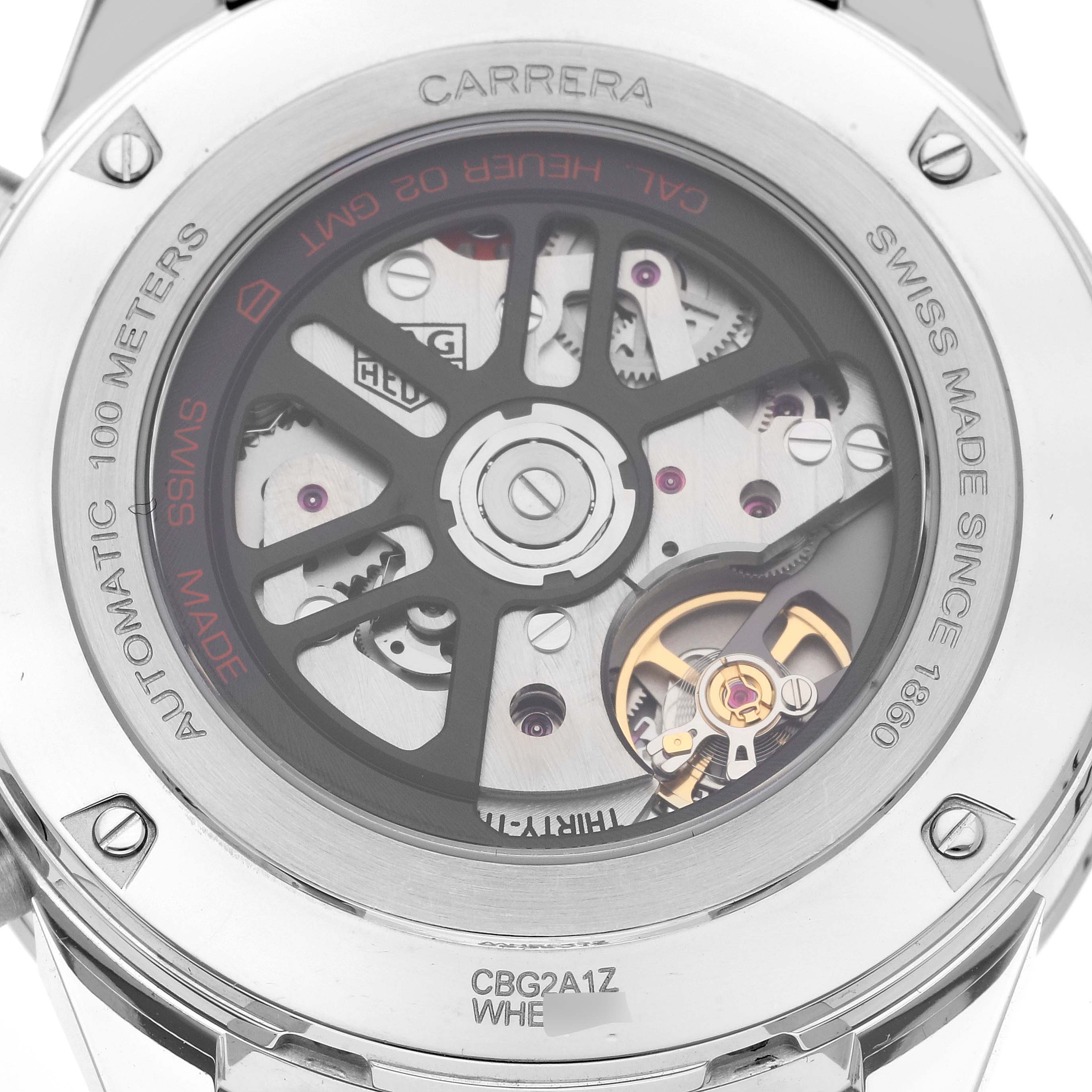 The image shows the back of a Tag Heuer Carrera CBG2A1Z.BA0658 Men's Stainless Steel Black Dial CBG2A1Z.BA0658 Men's Stainless Steel Black Dial watch, highlighting its inner mechanisms and inscriptions on the case.