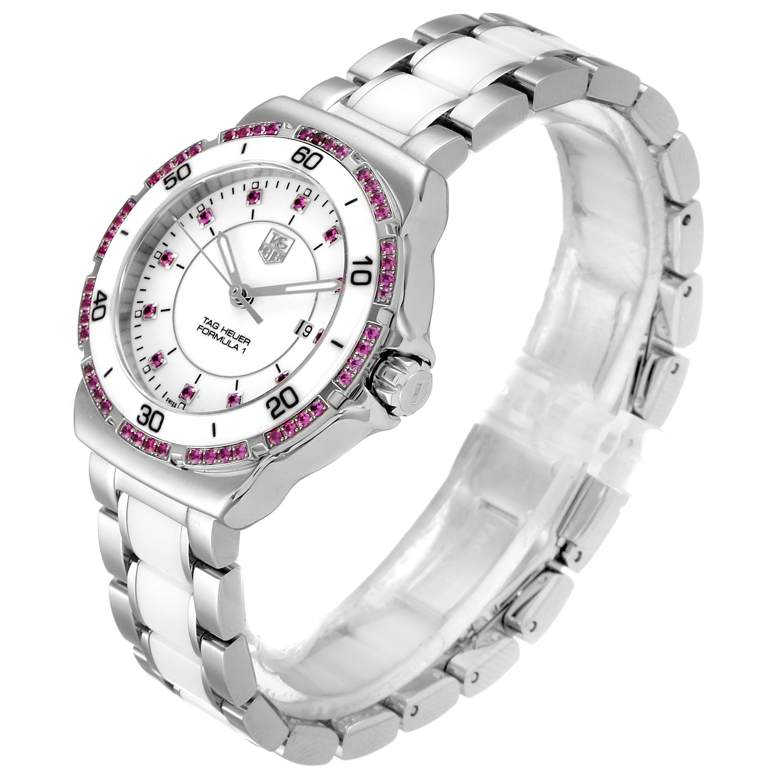 The Tag Heuer Formula 1 WAH1319.BA0868 Women's Stainless Steel White Dial WAH1319.BA0868 Women's Stainless Steel White Dial watch is shown at a three-quarter angle highlighting the face, bezel, bracelet, and crown.