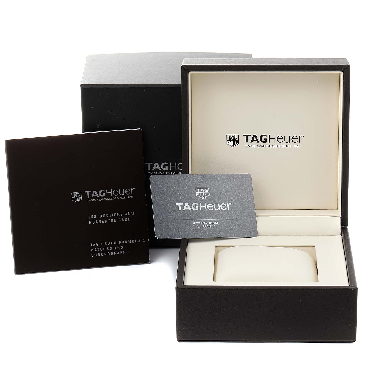 The image shows the box, instruction booklet, and warranty card for the Tag Heuer Formula 1 WAH1319.BA0868 Women's Stainless Steel White Dial WAH1319.BA0868 Women's Stainless Steel White Dial watch.