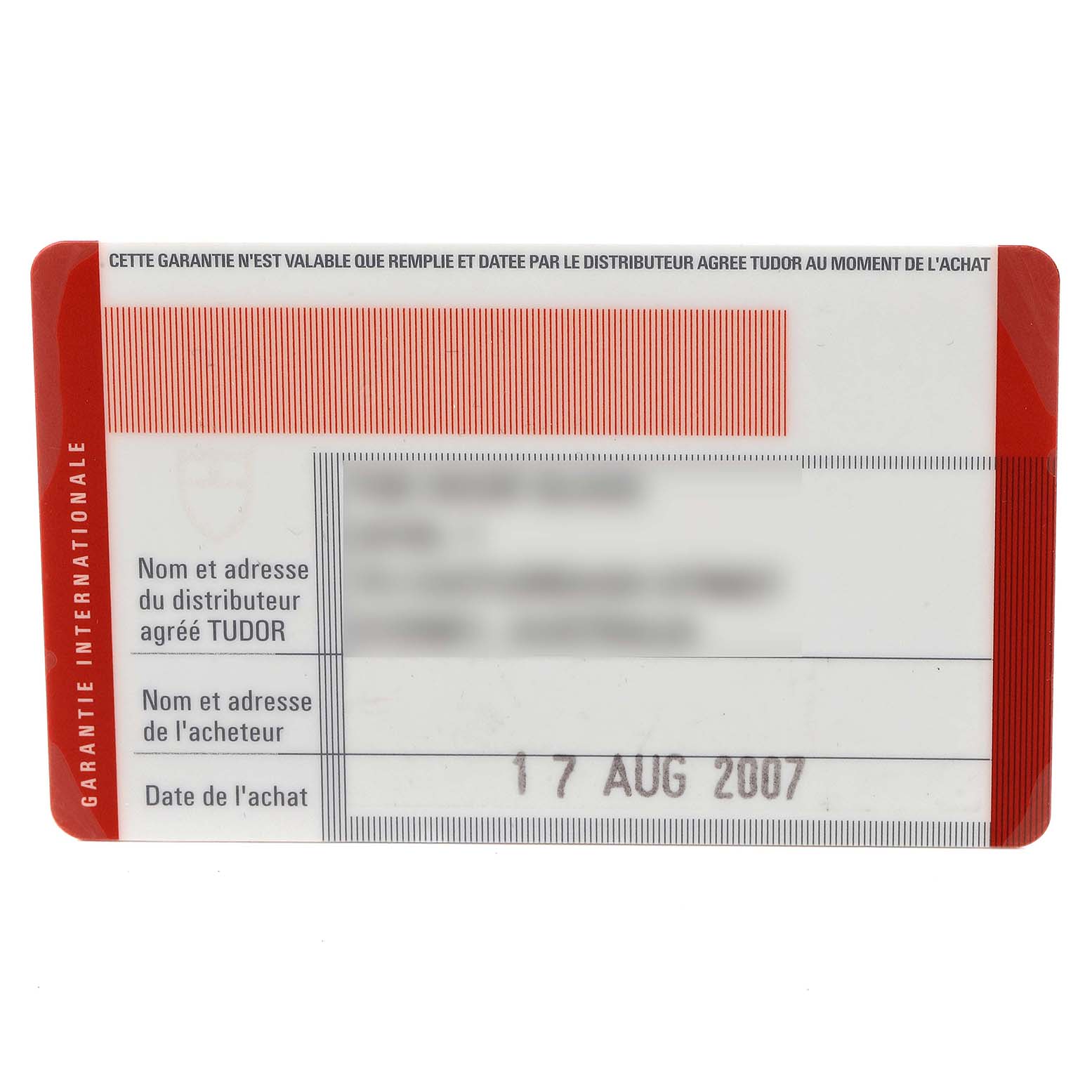 This image shows the warranty card for the Sport Chronograph model by Tudor, displaying the date of purchase and other details.