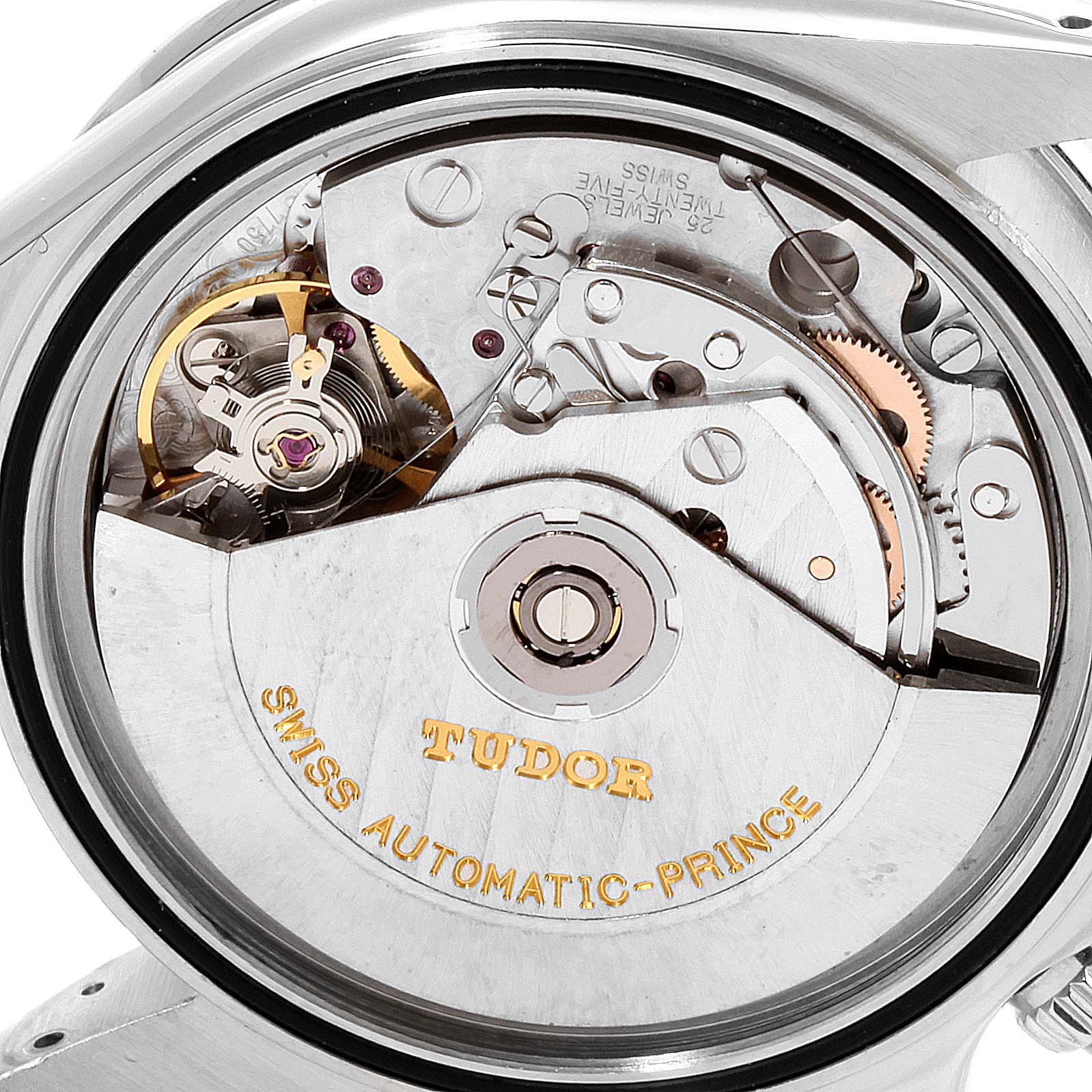 This image shows a close-up of the movement mechanism from the back of a Tudor Prince watch, highlighting the inner workings and engravings.
