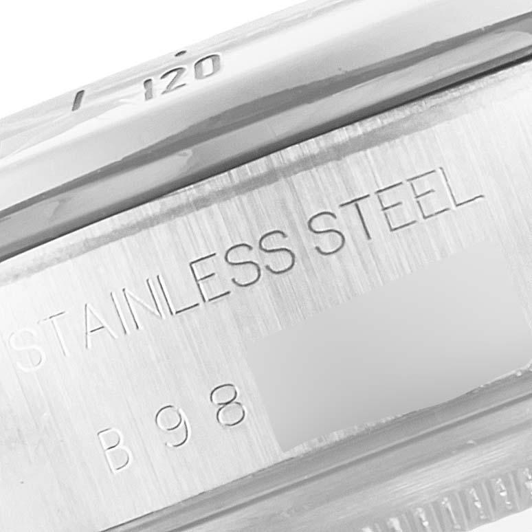 This close-up image of a Tudor Prince model watch shows the stainless steel case engraving.