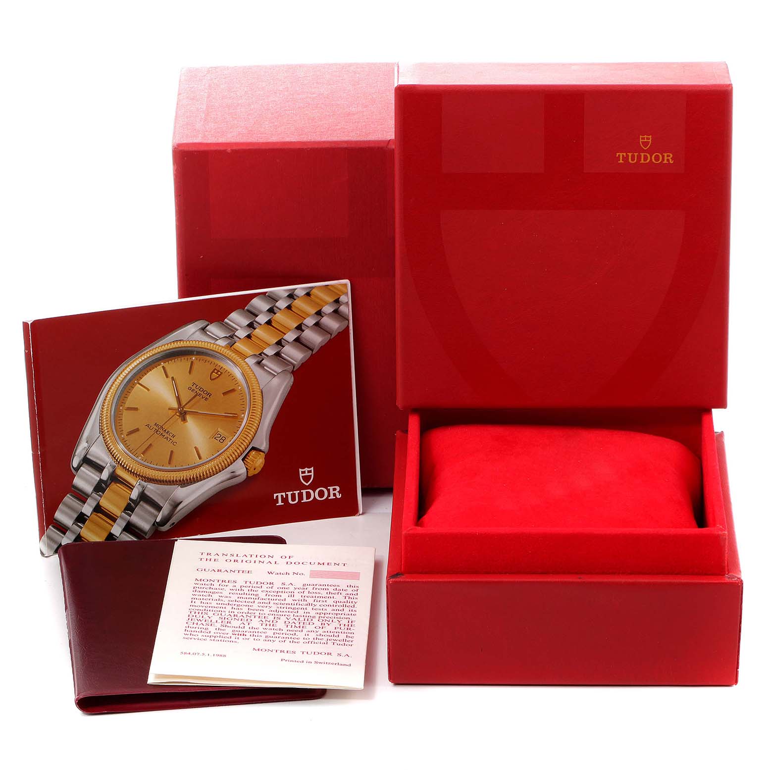 The Tudor Prince watch is shown with its box, warranty card, and booklet at a slightly angled front view.