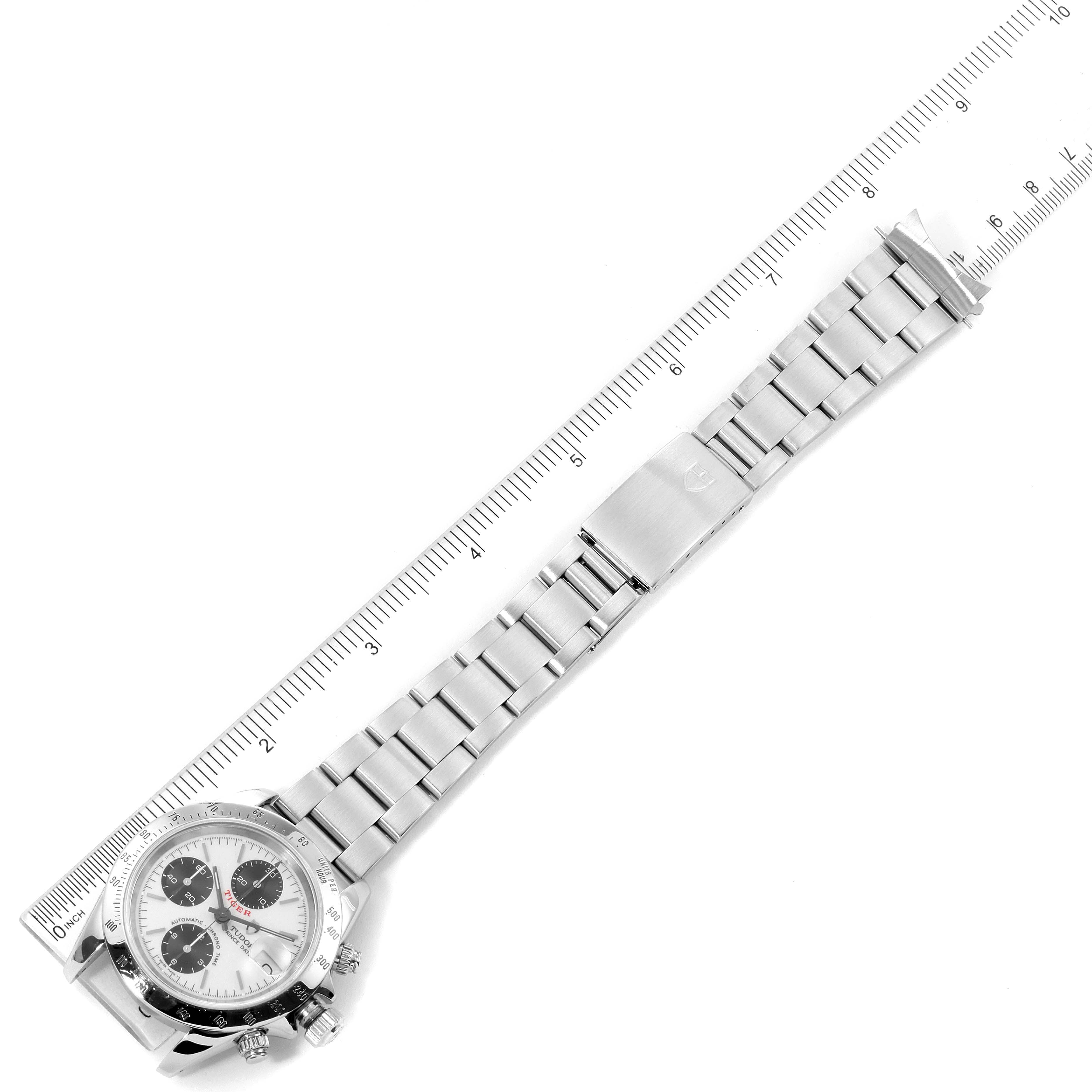 This image shows a Tudor Prince watch with a metal bracelet and a ruler measuring its length from an overhead angle.