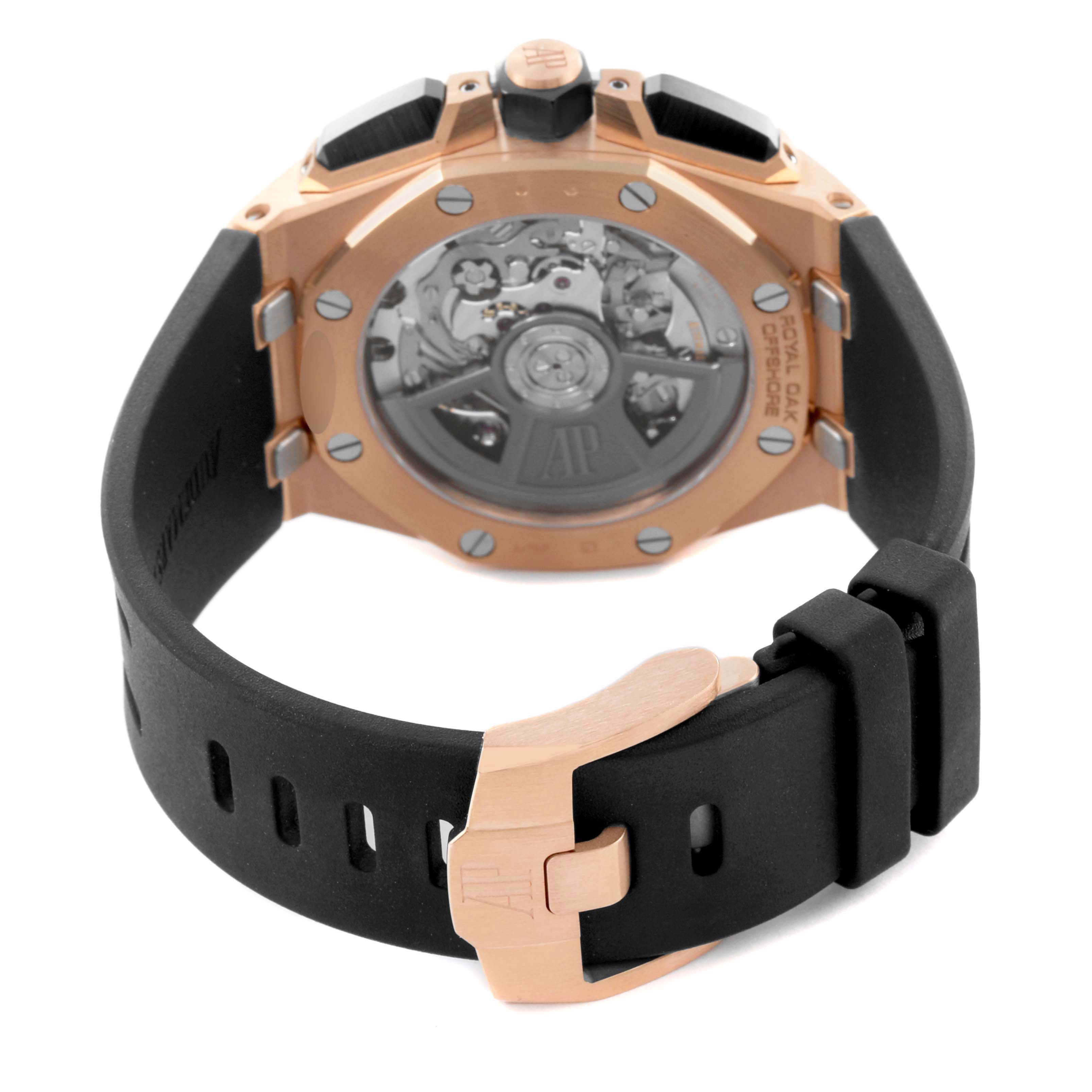 The image shows the back of the Audemars Piguet Royal Oak Offshore 26420RO.OO.A002CA.01 Men's Rose Gold Black Dial 26420RO.OO.A002CA.01 Men's Rose Gold Black Dial, highlighting the movement and strap with clasp.
