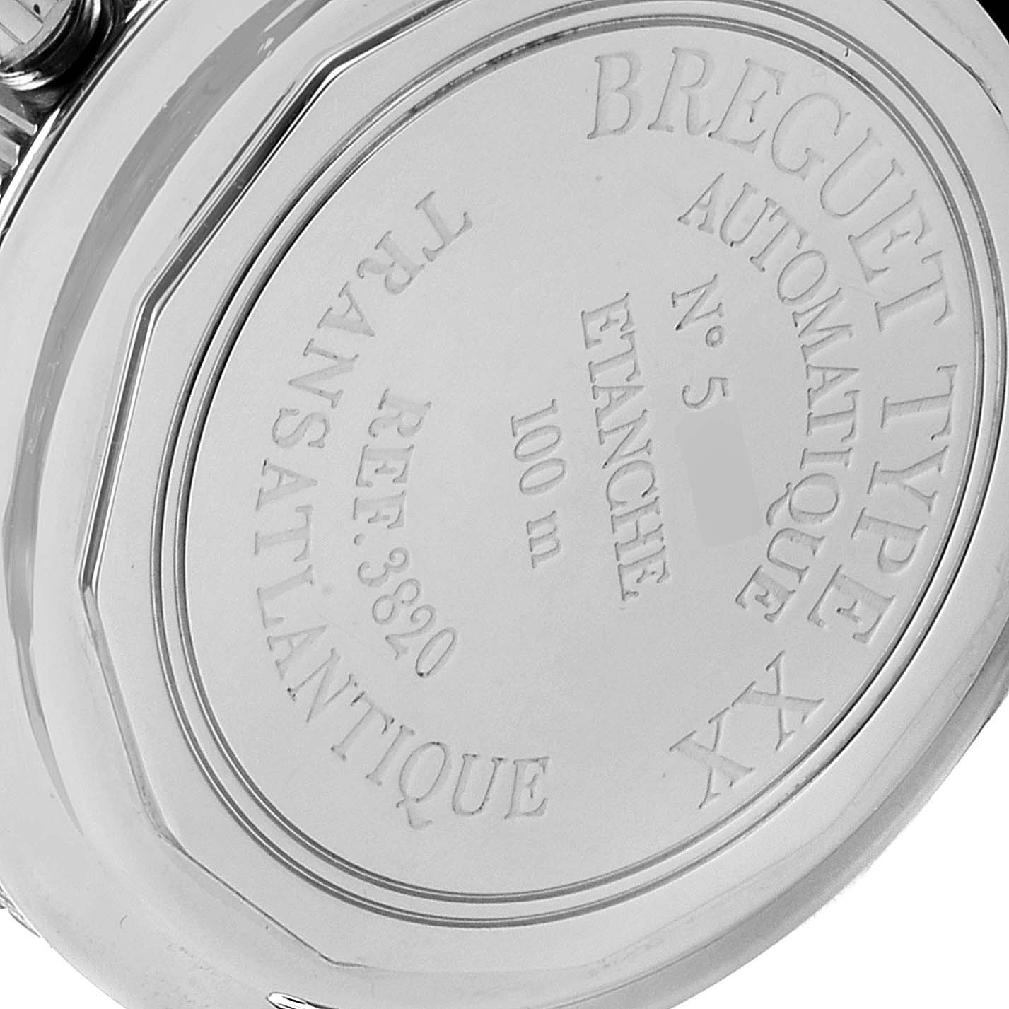 The image shows the back case of a Breguet Type XX watch, highlighting engravings including model details and specifications.