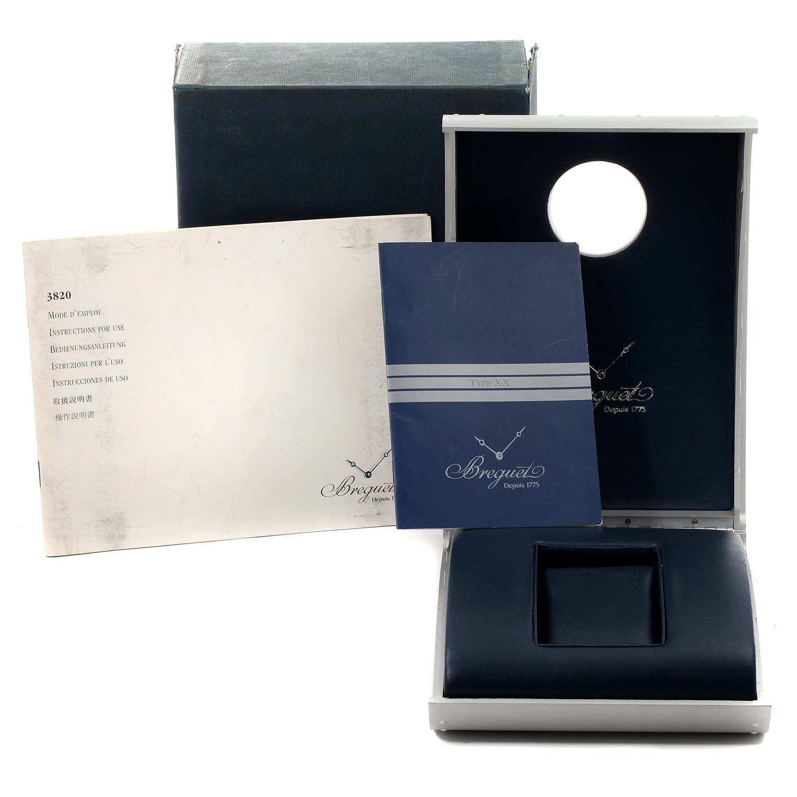 The image shows the packaging, instruction manual, and empty display box for the Breguet Type XX - XXI - XXII 3820ST/H2/9W6 Men's Stainless Steel Black Dial 3820ST/H2/9W6 Men's Stainless Steel Black Dial watch.