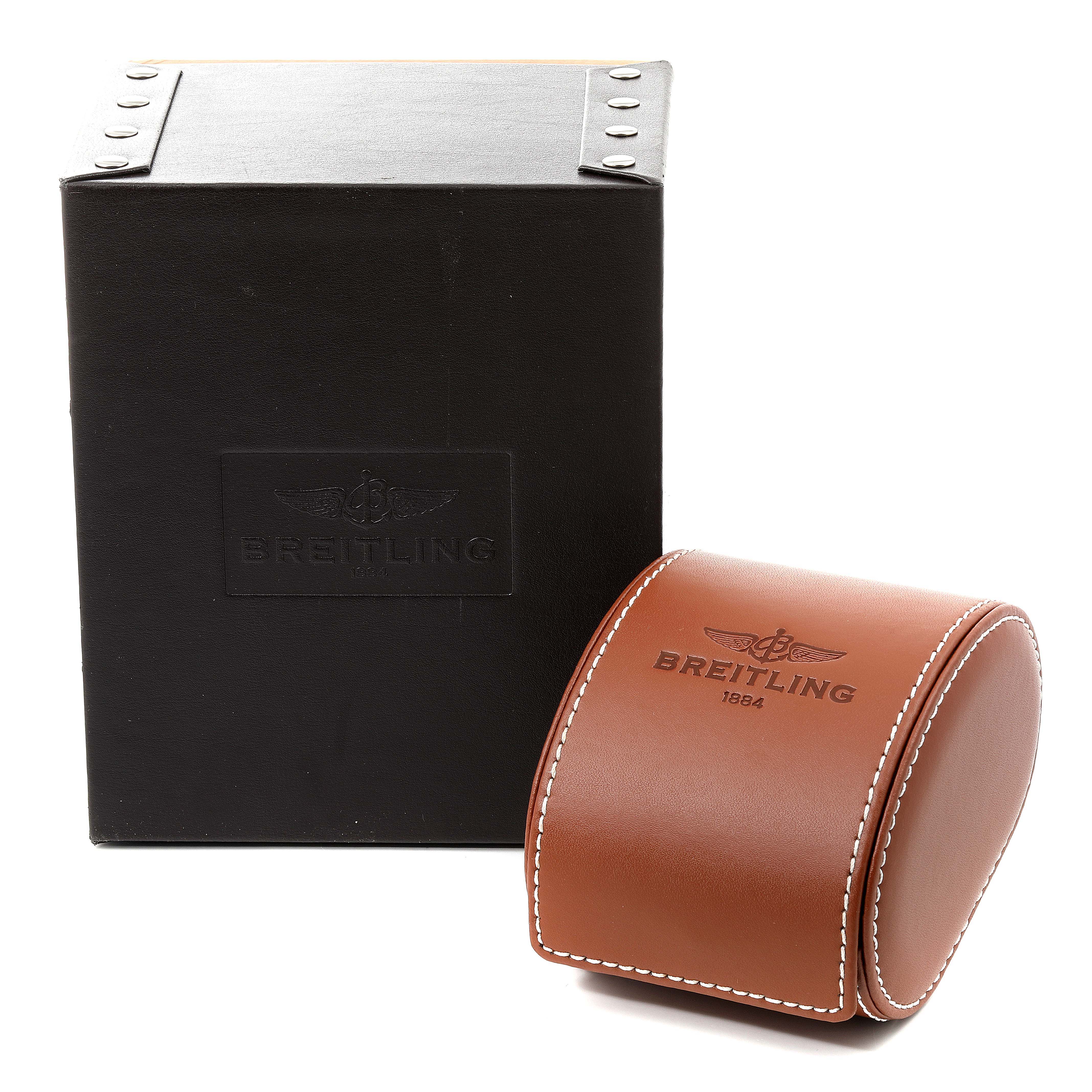 The image shows the packaging for the Breitling Bentley K25362 Men's Yellow Gold Blue Dial K25362 Men's Yellow Gold Blue Dial model, including a black box and a brown leather case.