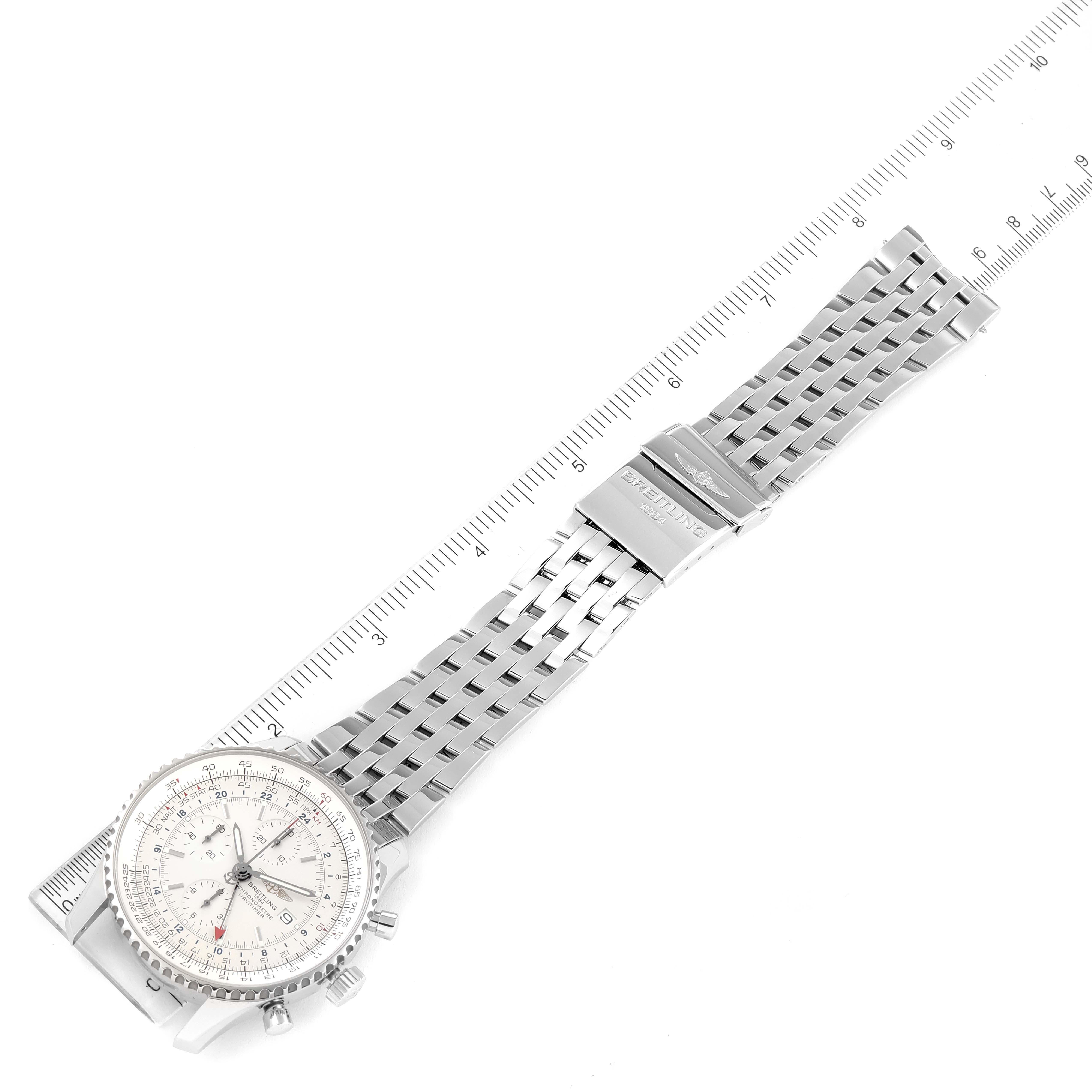 This image shows a Breitling Navitimer A24322 Men's Stainless Steel Silver Dial A24322 Men's Stainless Steel Silver Dial watch laid flat with its full metal bracelet and clasp visible, captured from a top-down angle.