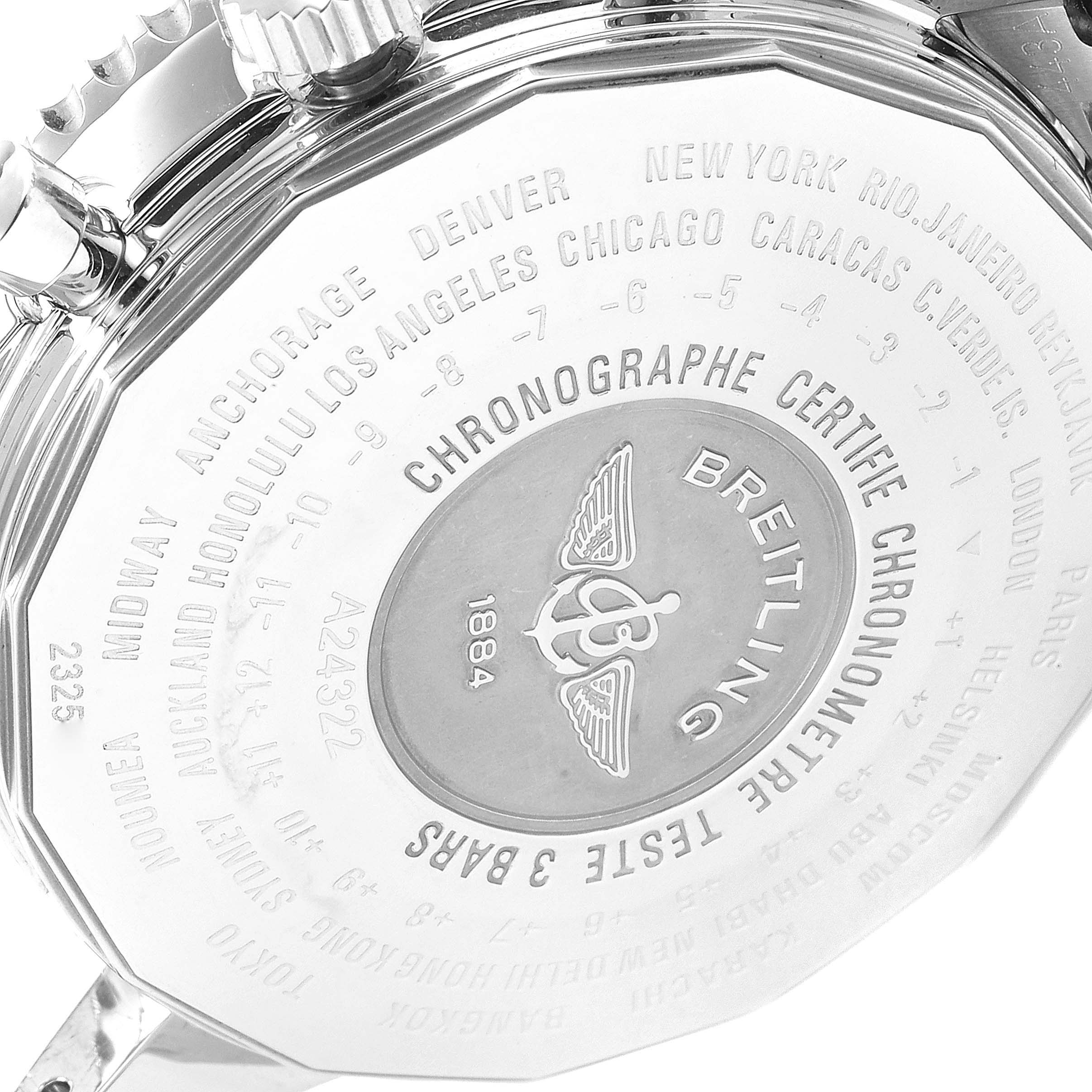 This image shows the back case of a Breitling Navitimer A24322 Men's Stainless Steel Silver Dial A24322 Men's Stainless Steel Silver Dial watch, with engraved details and a world time zone scale.