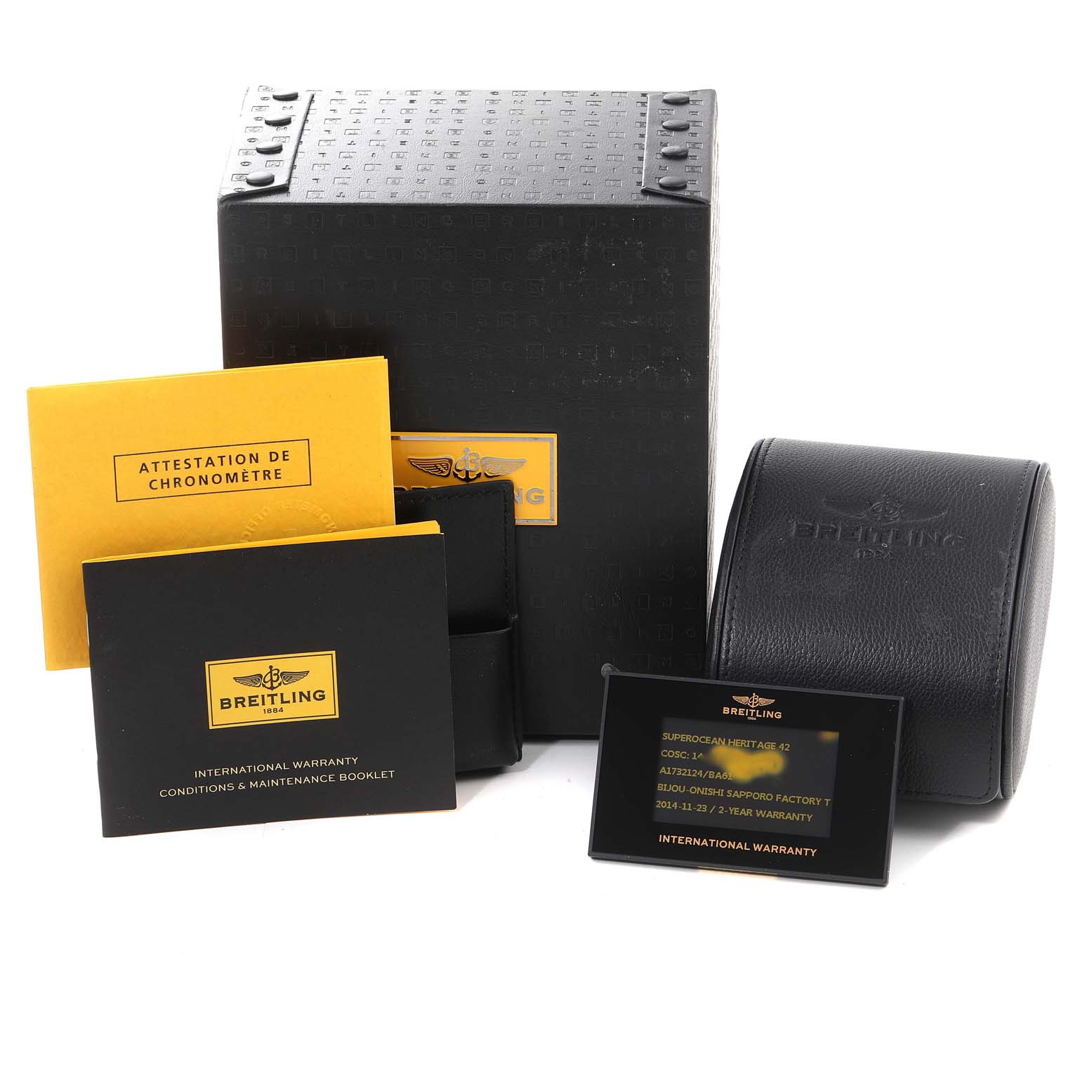 The image shows the packaging and documentation for a Breitling Superocean A17321 Men's Stainless Steel Black Dial A17321 Men's Stainless Steel Black Dial watch, including the box, warranty card, and maintenance booklet.