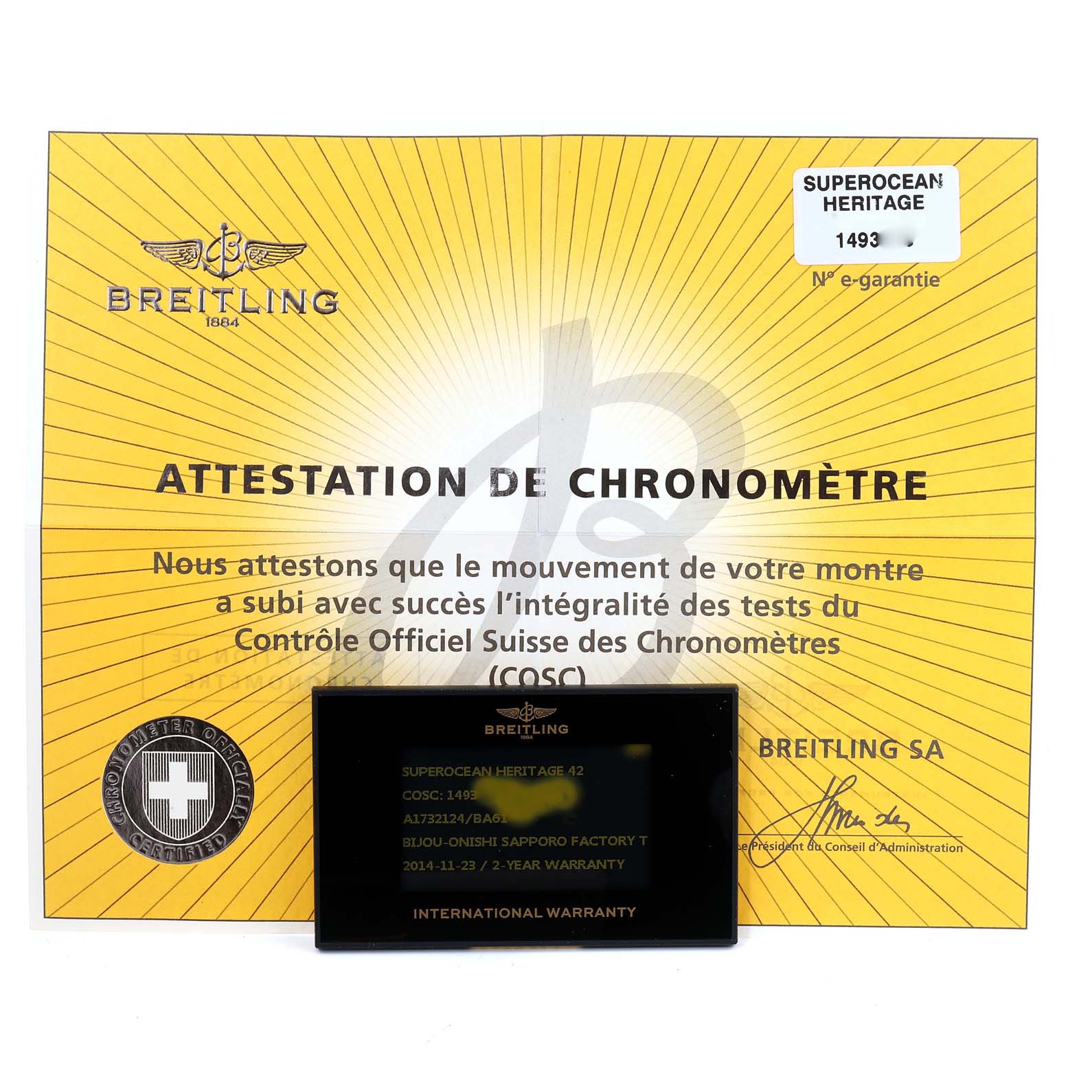 The image shows the certification and international warranty card for the Breitling Superocean A17321 Men's Stainless Steel Black Dial A17321 Men's Stainless Steel Black Dial model.