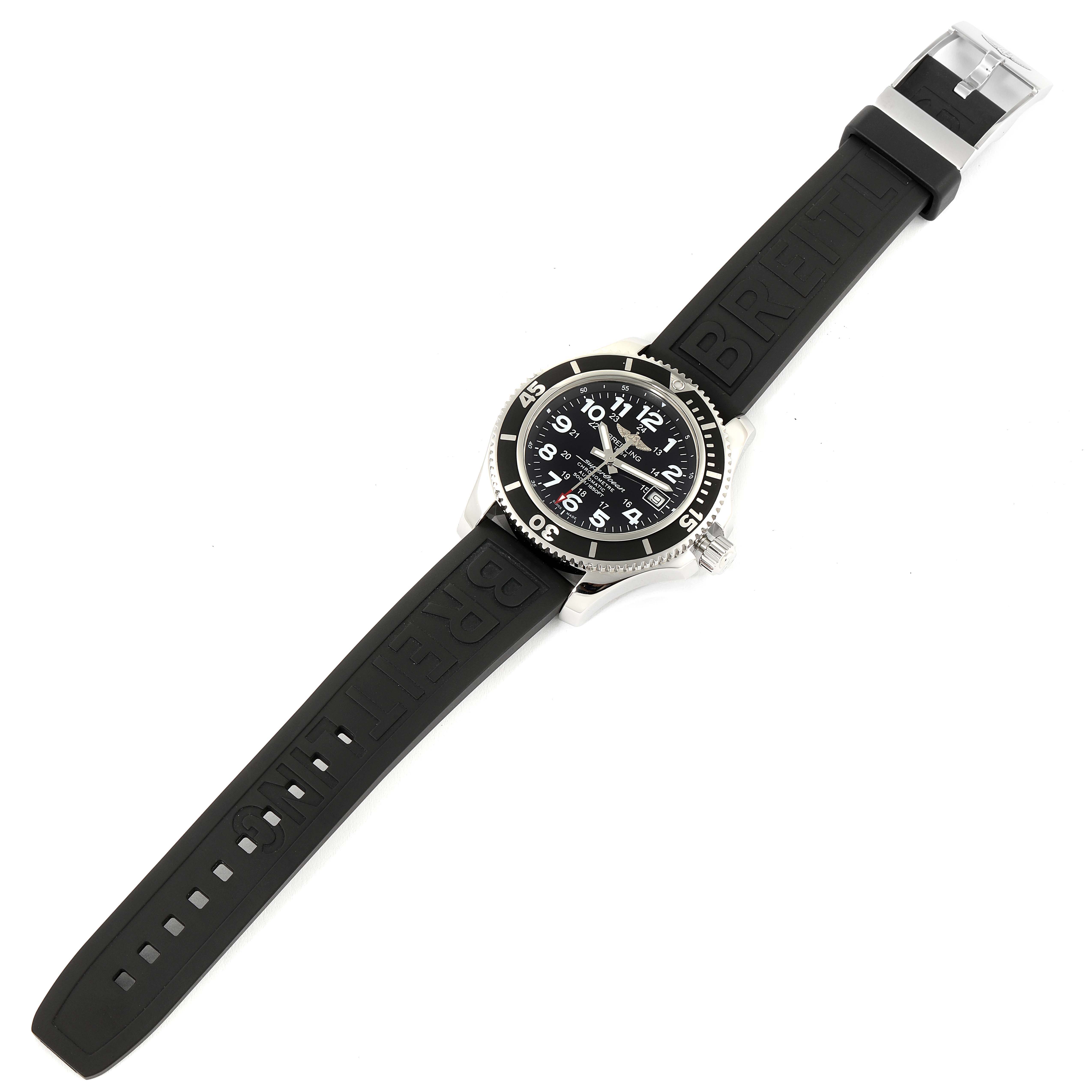 This image showcases the Breitling Superocean A17365 Men's Stainless Steel Black Dial A17365 Men's Stainless Steel Black Dial watch from a top-down angle, highlighting its black rubber strap and round face.