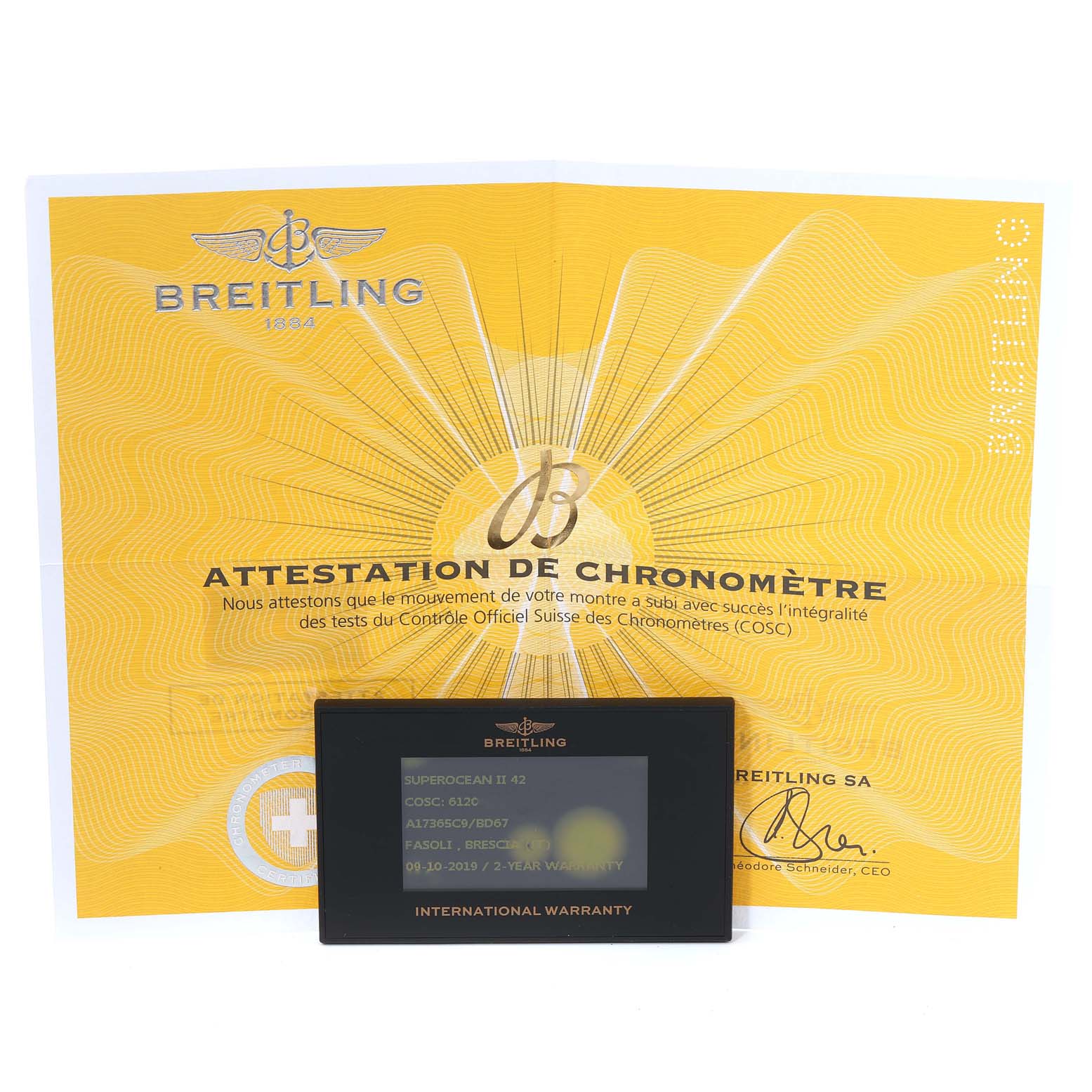 The image shows the warranty card and chronometer certification for a Breitling Superocean A17365 Men's Stainless Steel Black Dial A17365 Men's Stainless Steel Black Dial watch.