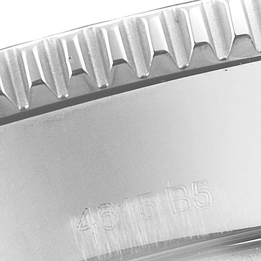 The image shows a close-up of the bezel with its ridged edge and part of the case of the Breitling Superocean A17365 Men's Stainless Steel Blue Dial A17365 Men's Stainless Steel Blue Dial watch.