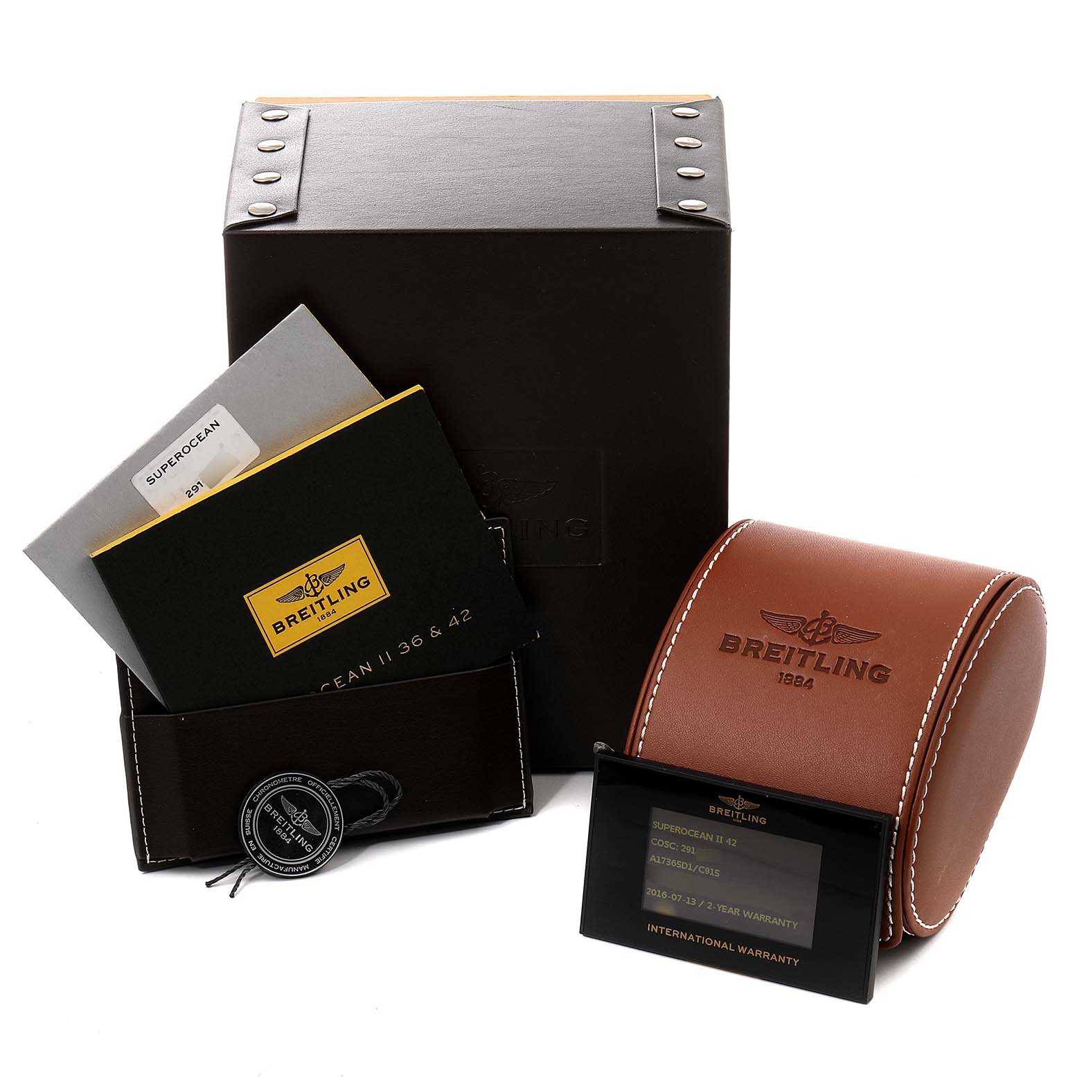 The image shows a Breitling Superocean A17365 Men's Stainless Steel Blue Dial A17365 Men's Stainless Steel Blue Dial watch box, warranty card, manuals, and a brown leather watch case, all from a front angle.